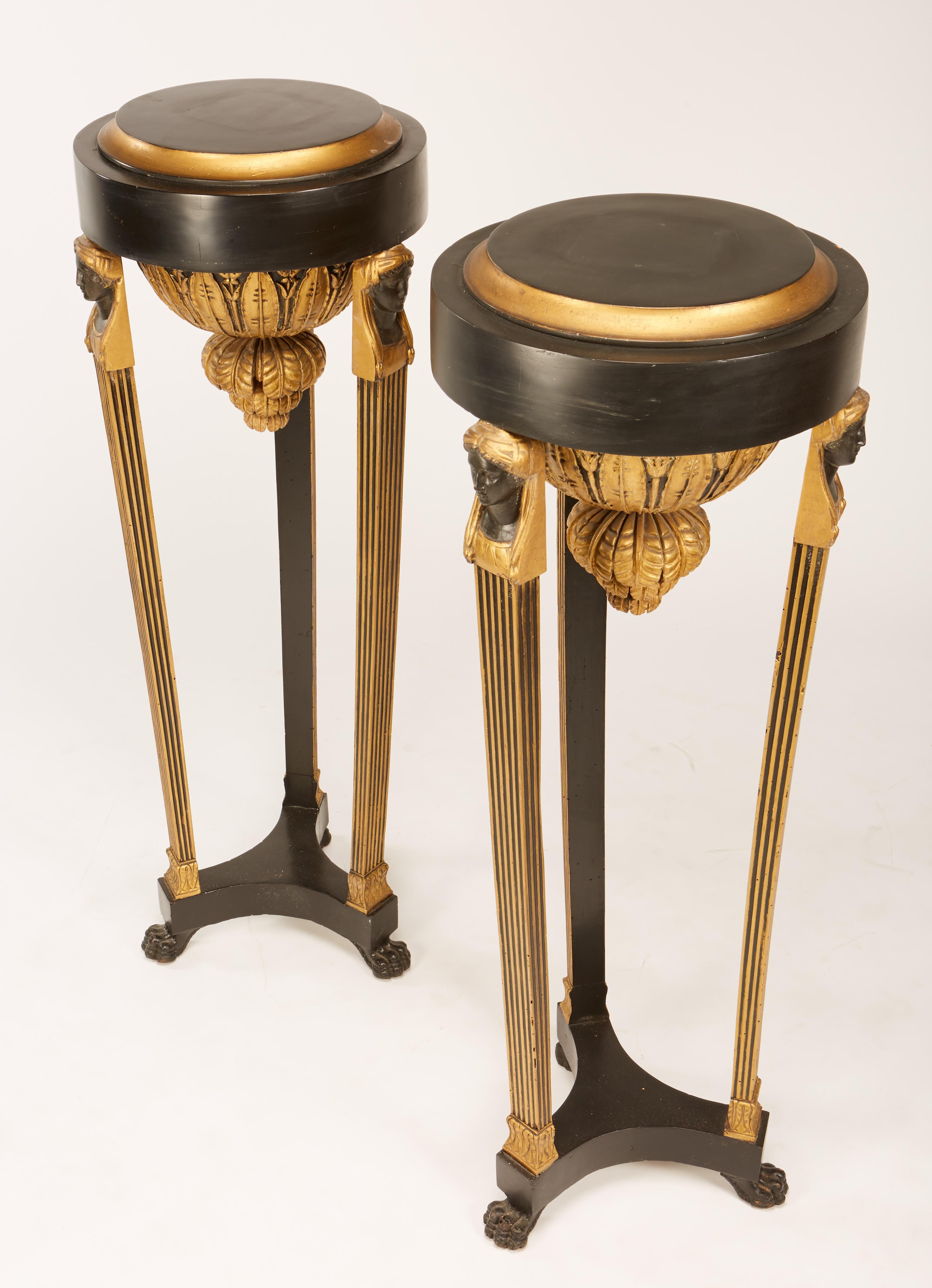Pair of Continental Neoclassic Black Painted and Parcel-gilt Torcheres, Italian For Sale 2