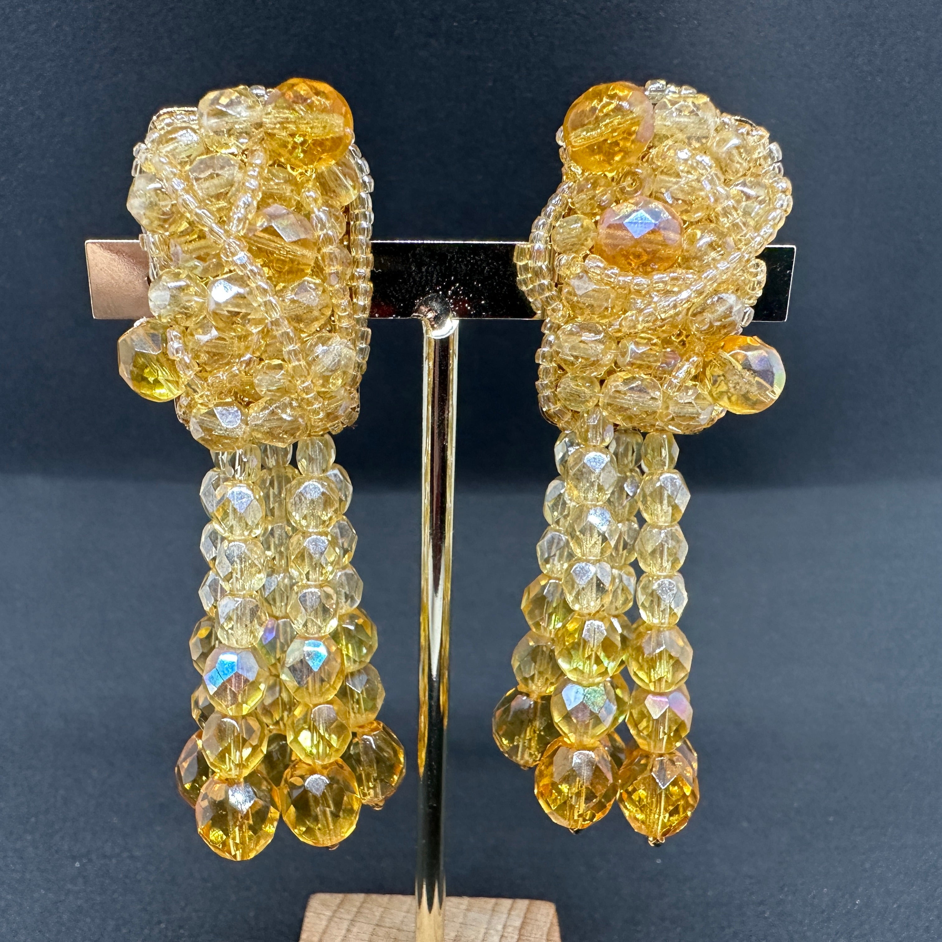 These earrings are bold and elegant, capturing the vintage essence Coppola e Toppo is known for, with their signature use of crystals and intricate designs. Perfect for making a statement with a luxurious, vintage appeal.Clip-on earrings. The