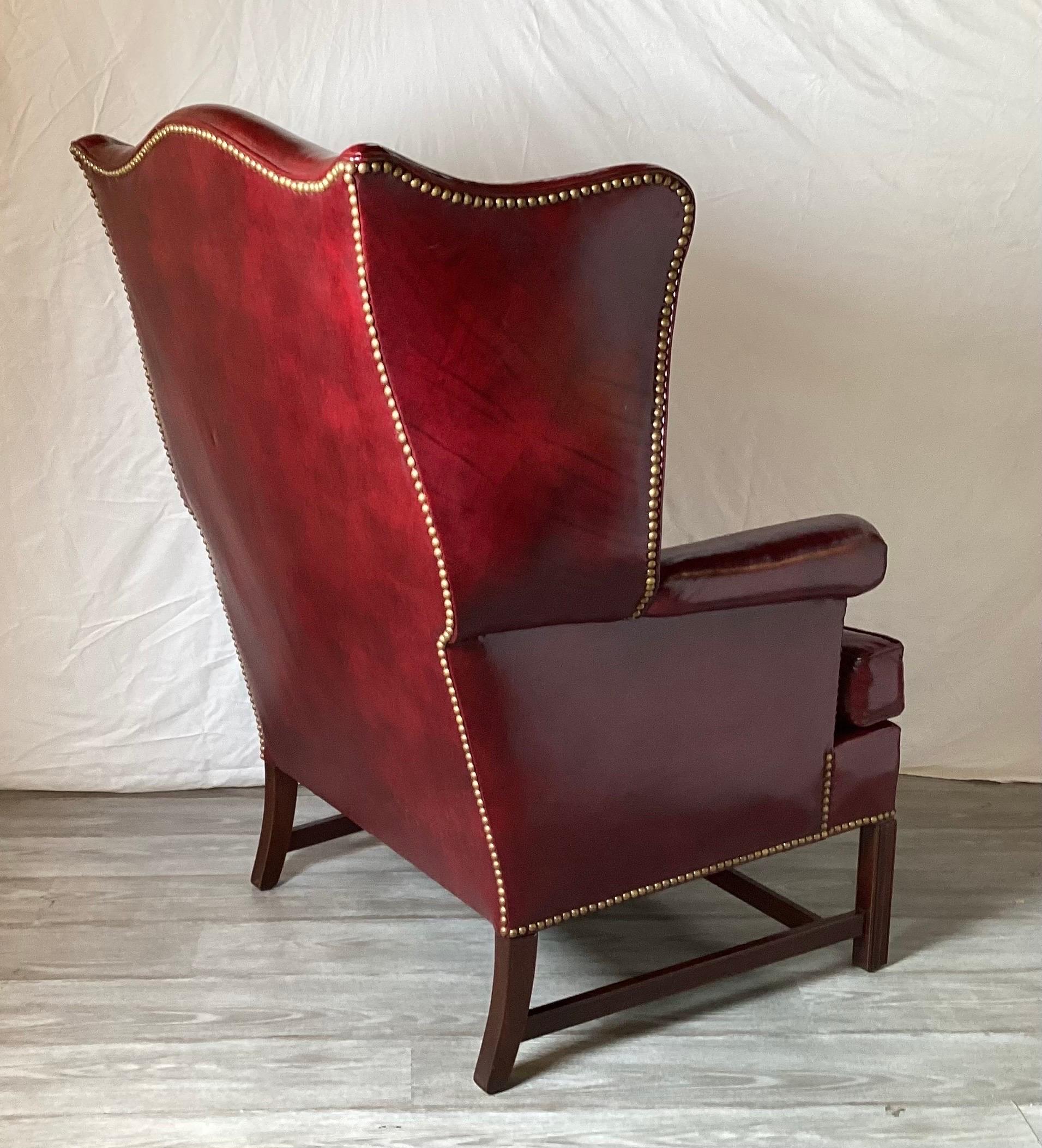Brass Pair of Cordovan Leather Devon Wing Chairs by Hickory Chair