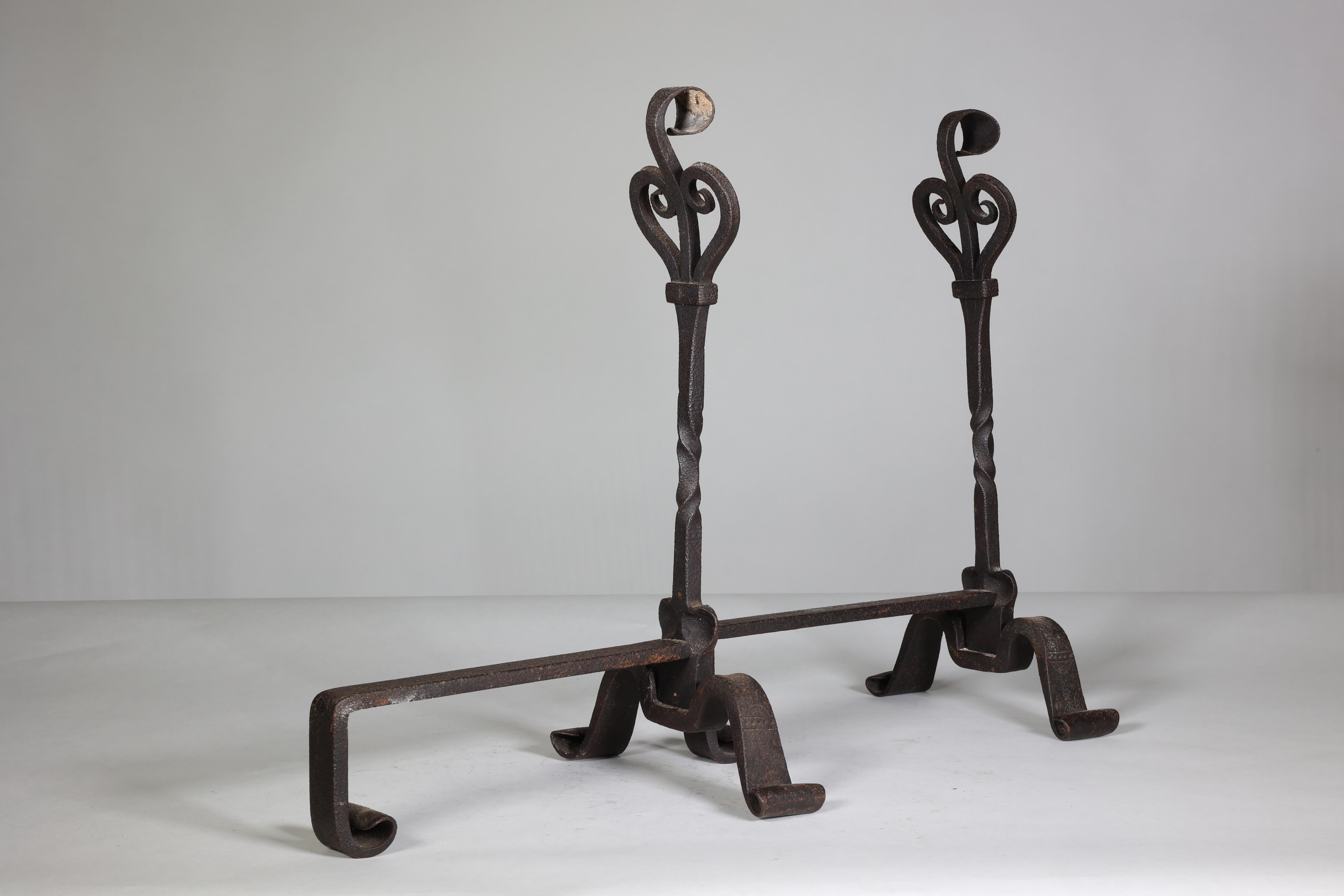 Early 20th Century Thornton & Downer Pair of Arts & Crafts Cotswold School handmade steel fire dogs For Sale