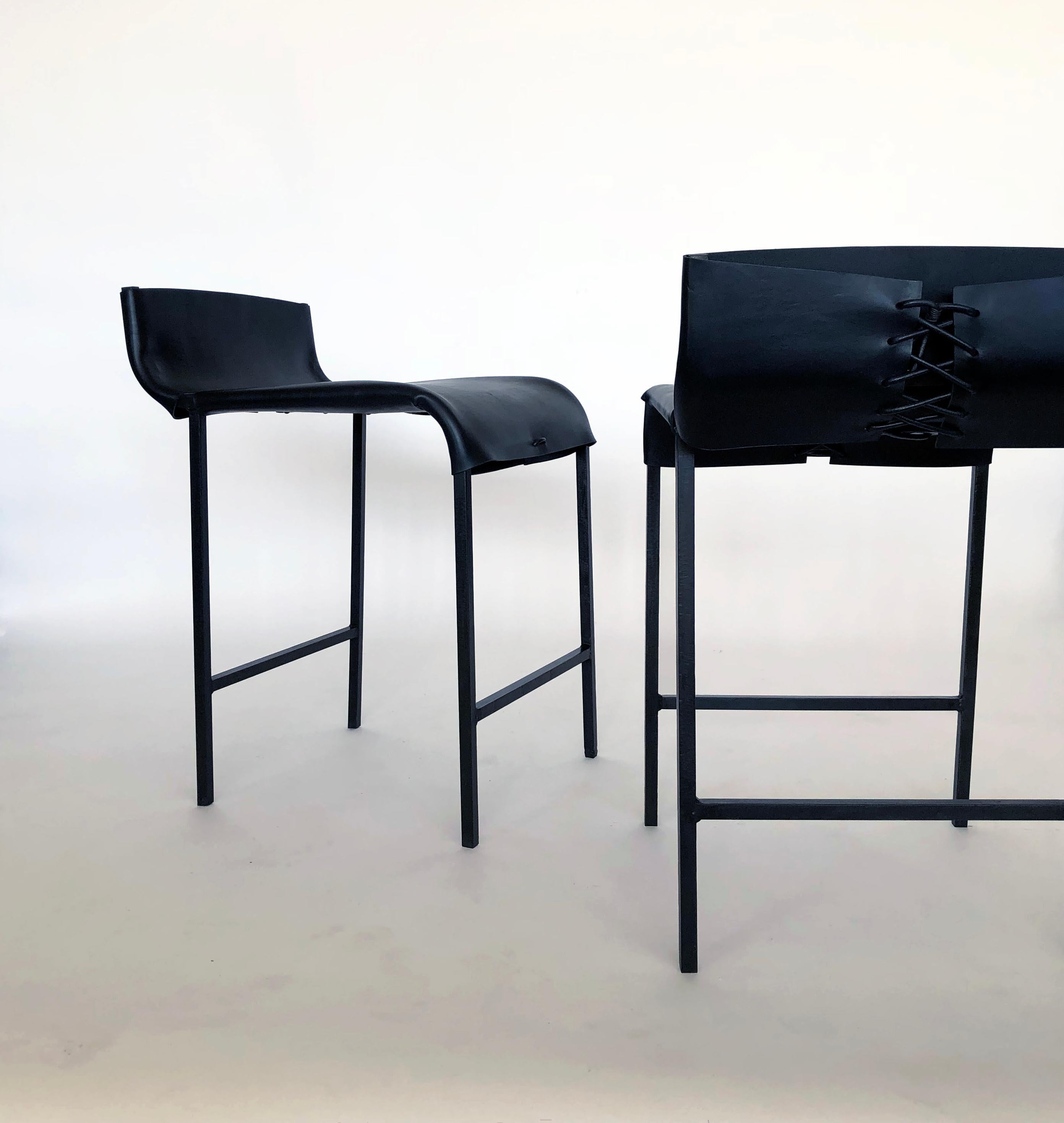 American A Pair of Counter Stools - Blackened Steel and Leather For Sale