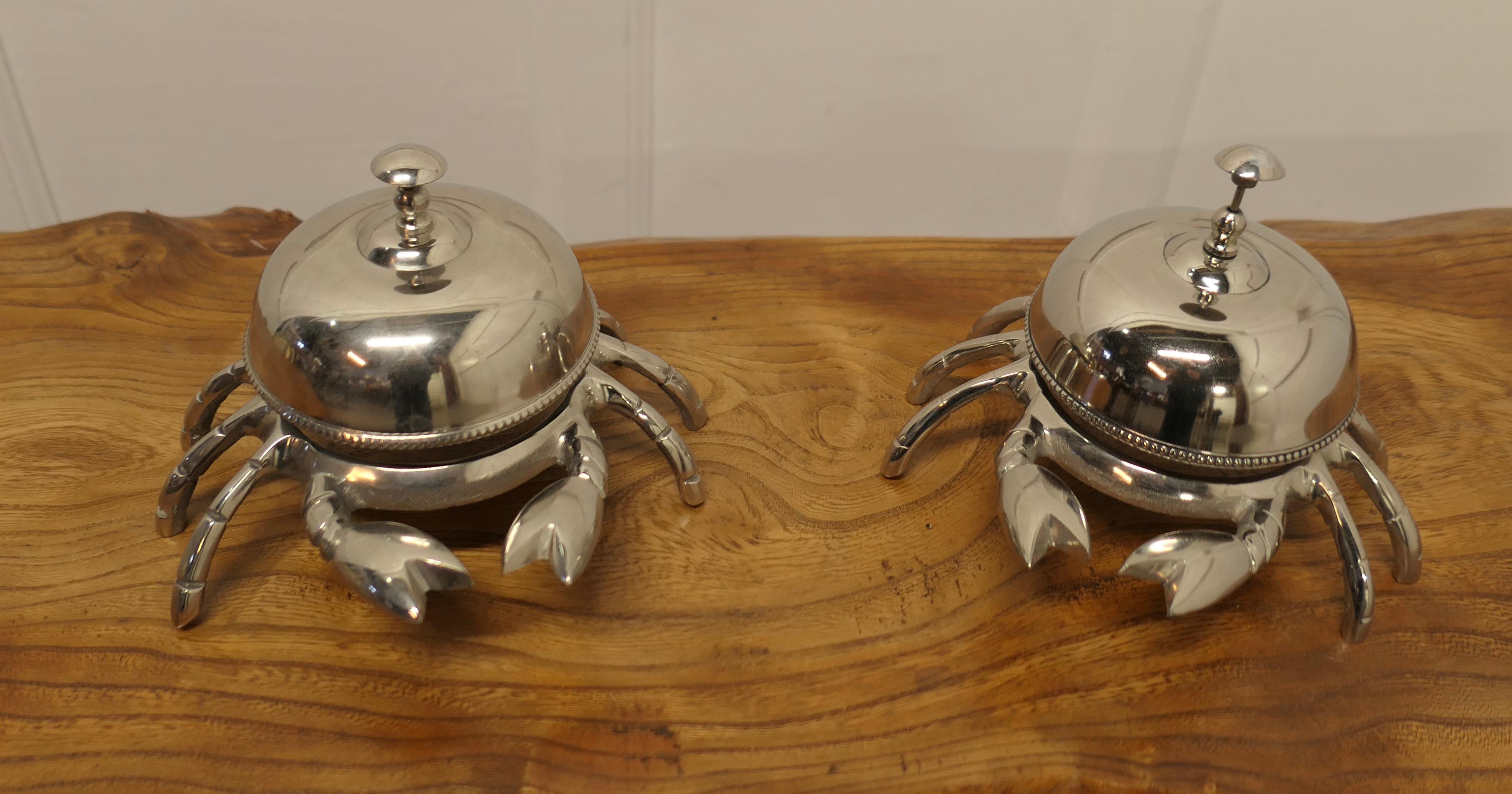 A Pair of Counter Top Courtesy Crab Bells

Very rare and unusual, these bells are both in the shape of a crab
What a super pair for a seafood restaurant
Made in stainless steel with a loud ding
The bells are 7” high, and 9” in diameter
TZX407