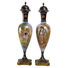 Pair of Covered Porcelain Baluster Vases