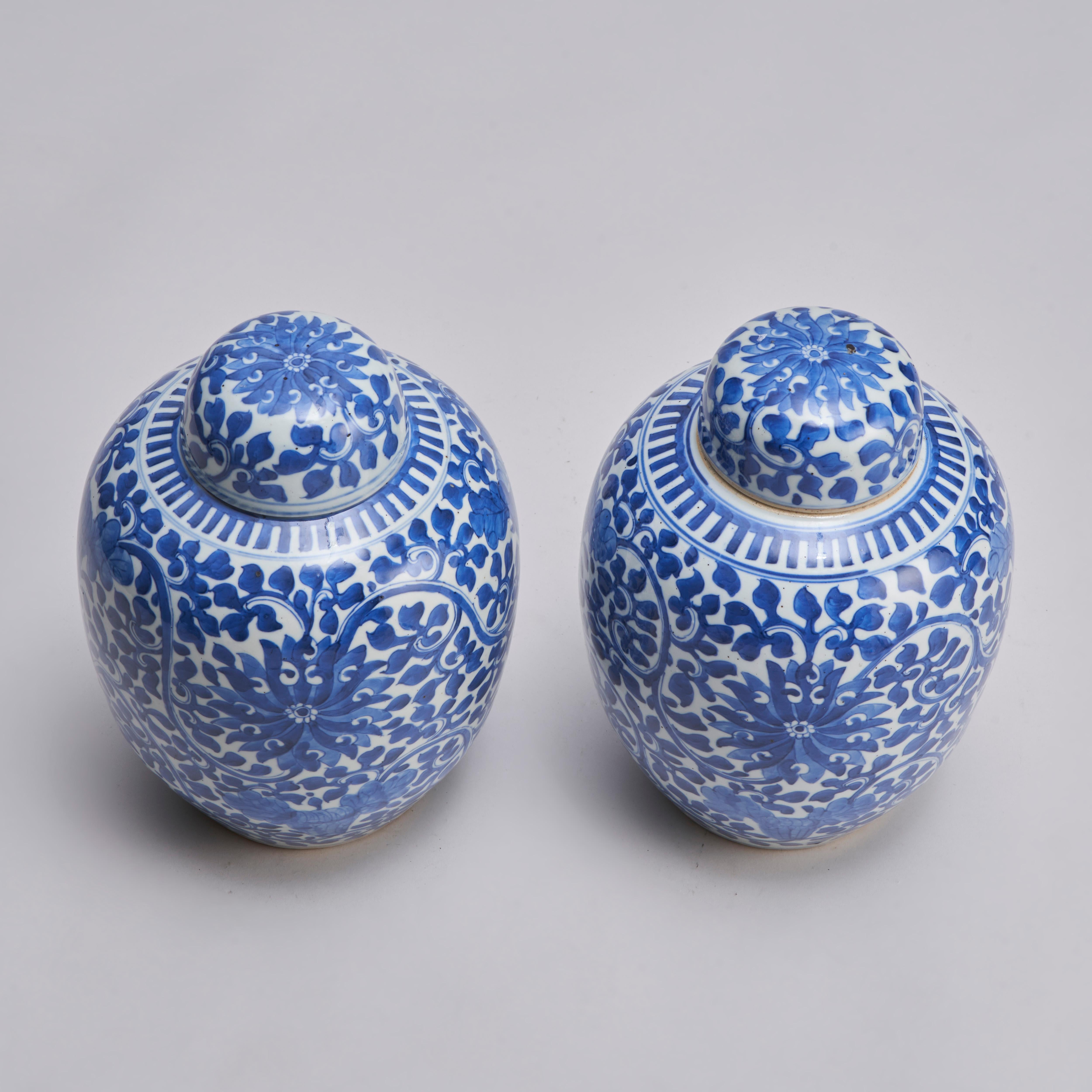19th Century A pair of covered porcelain jars with blue and white decoration For Sale