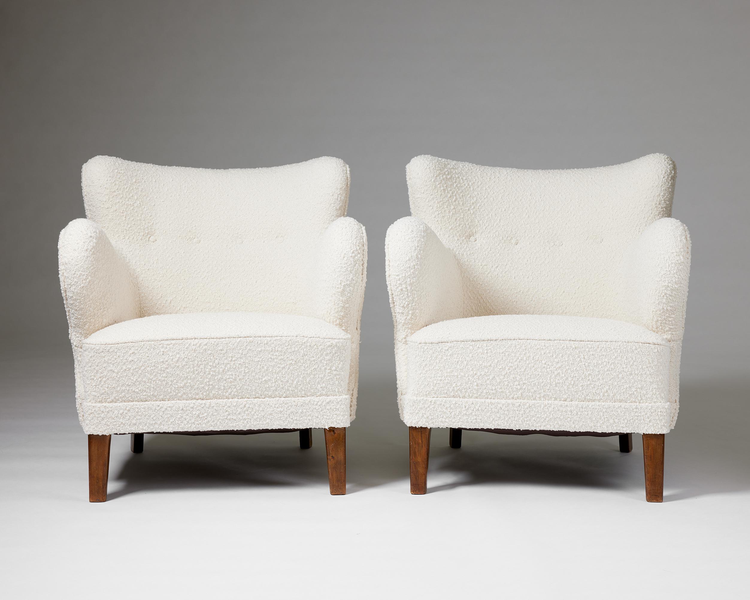 A pair of cream bouclé easy chairs, anonymous, Denmark, 1940s In Good Condition For Sale In Stockholm, SE