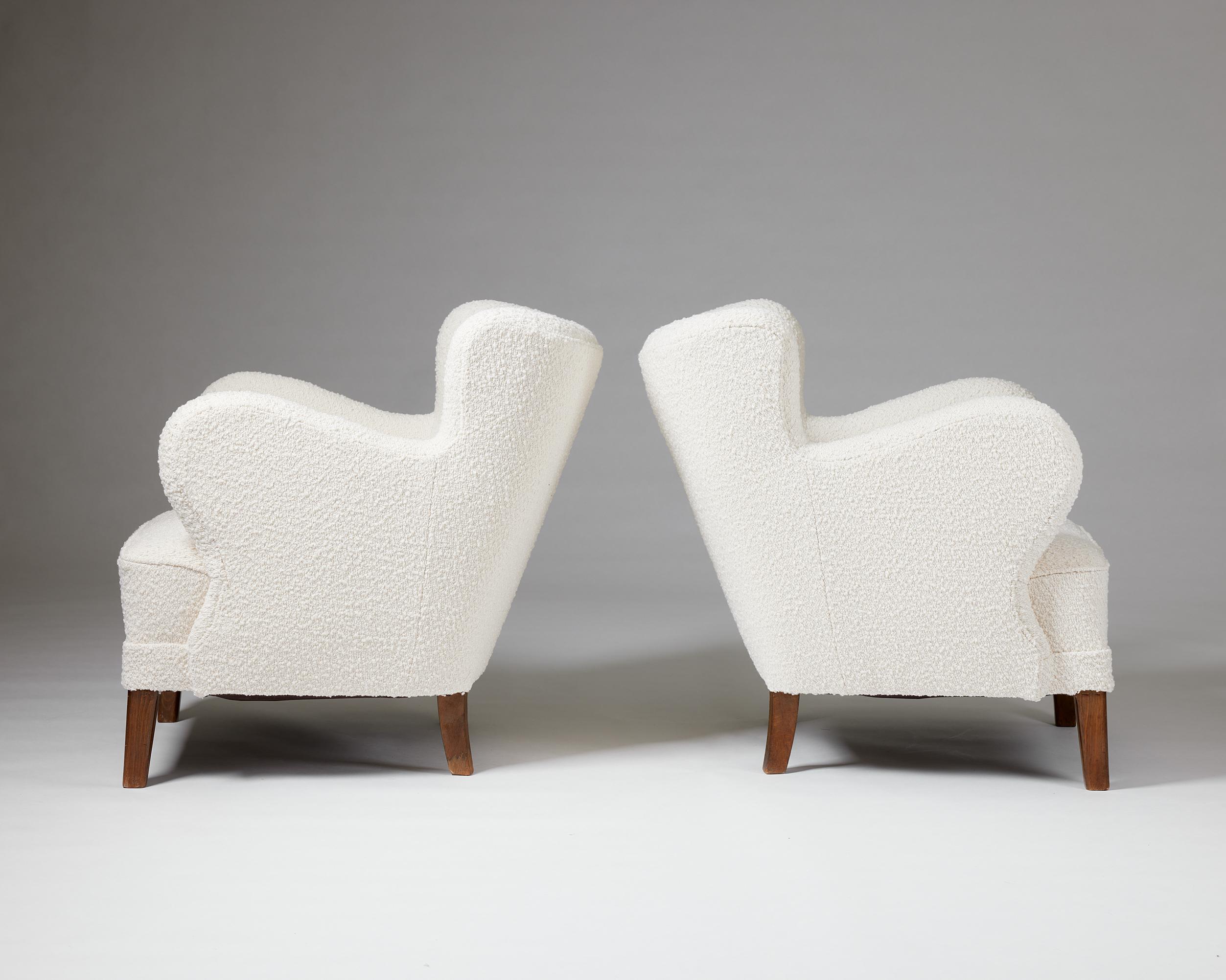 Mid-20th Century A pair of cream bouclé easy chairs, anonymous, Denmark, 1940s For Sale
