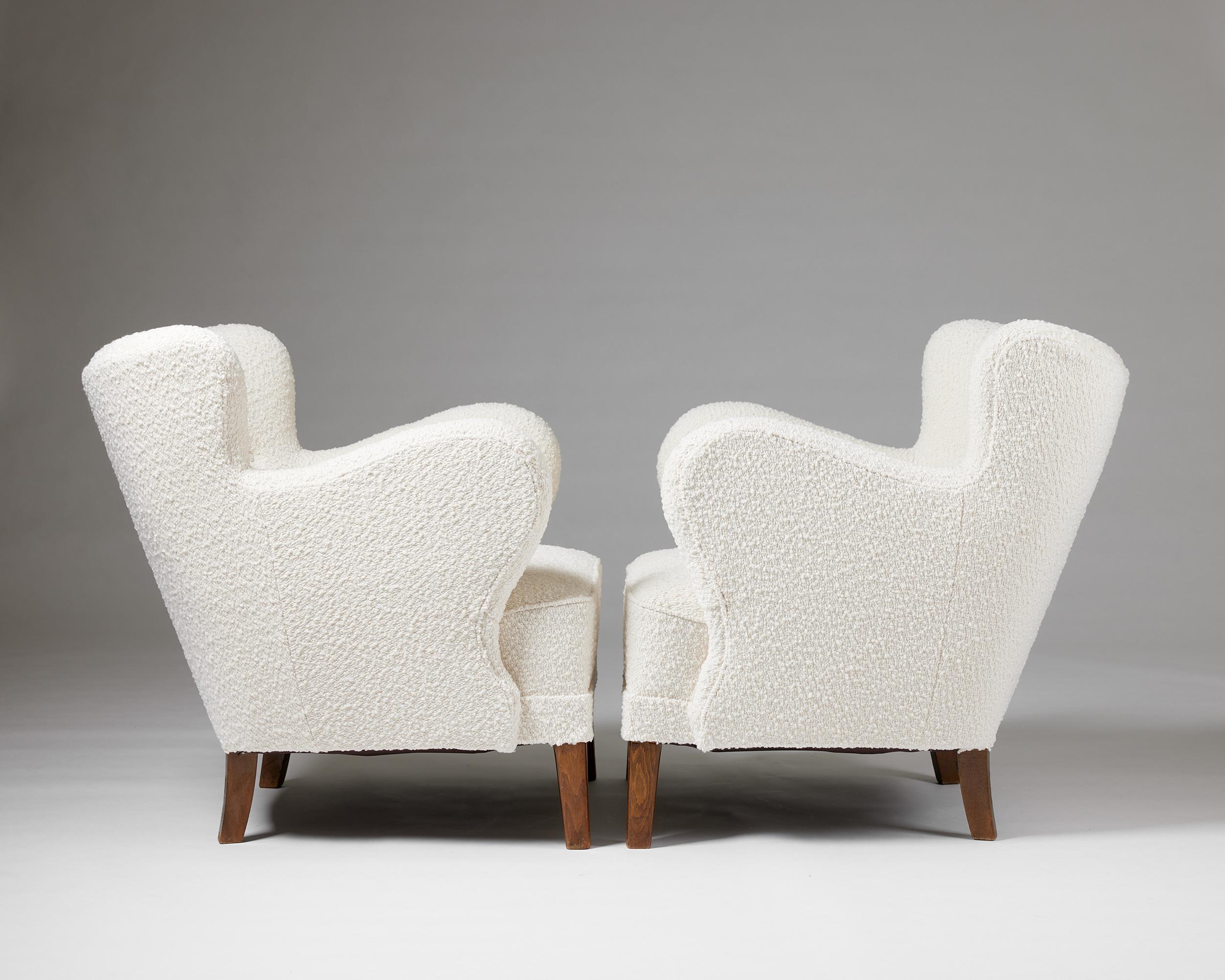 A pair of cream bouclé easy chairs, anonymous, Denmark, 1940s For Sale 1