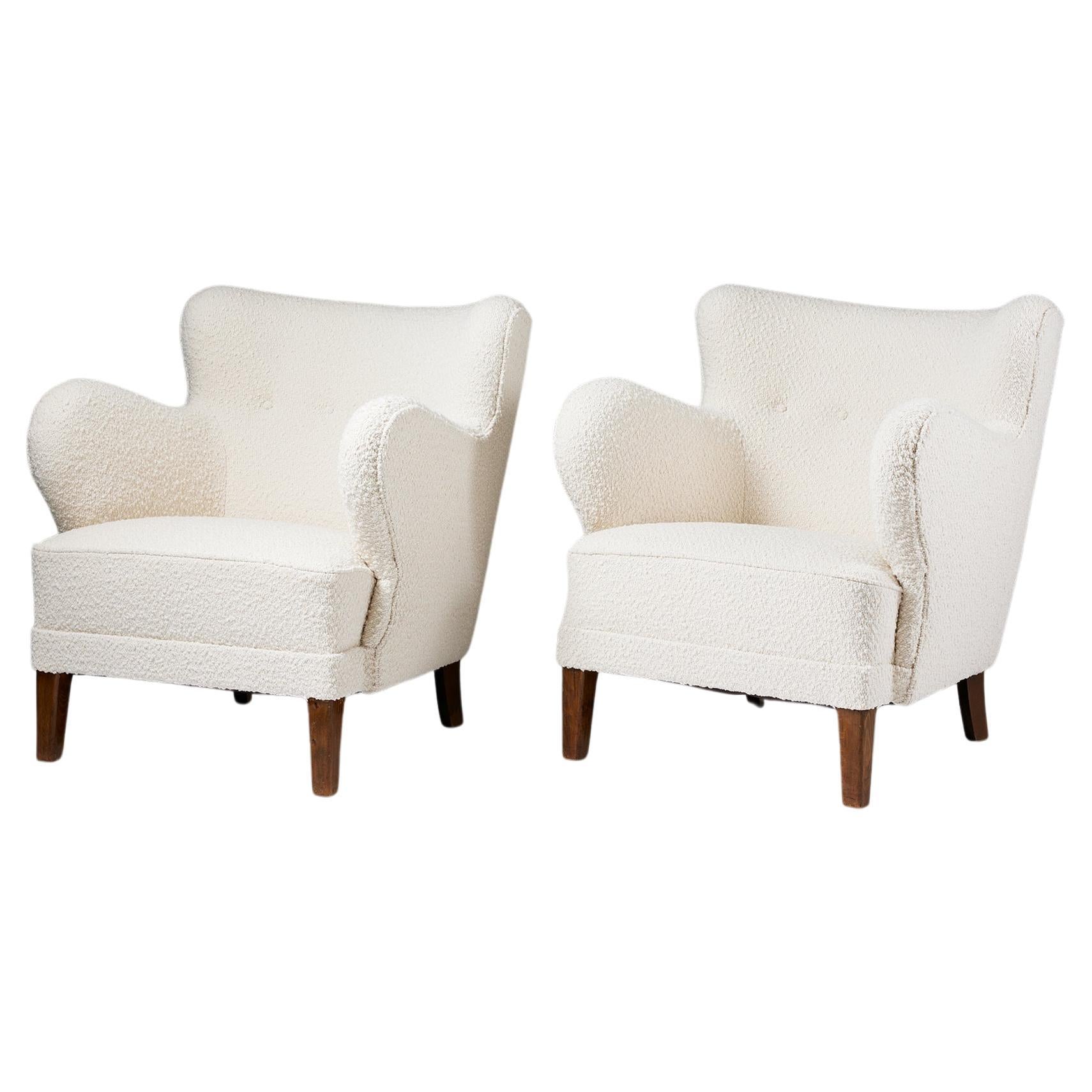 A pair of cream bouclé easy chairs, anonymous, Denmark, 1940s For Sale