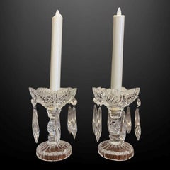 A pair of crystal cut candlestick lustres