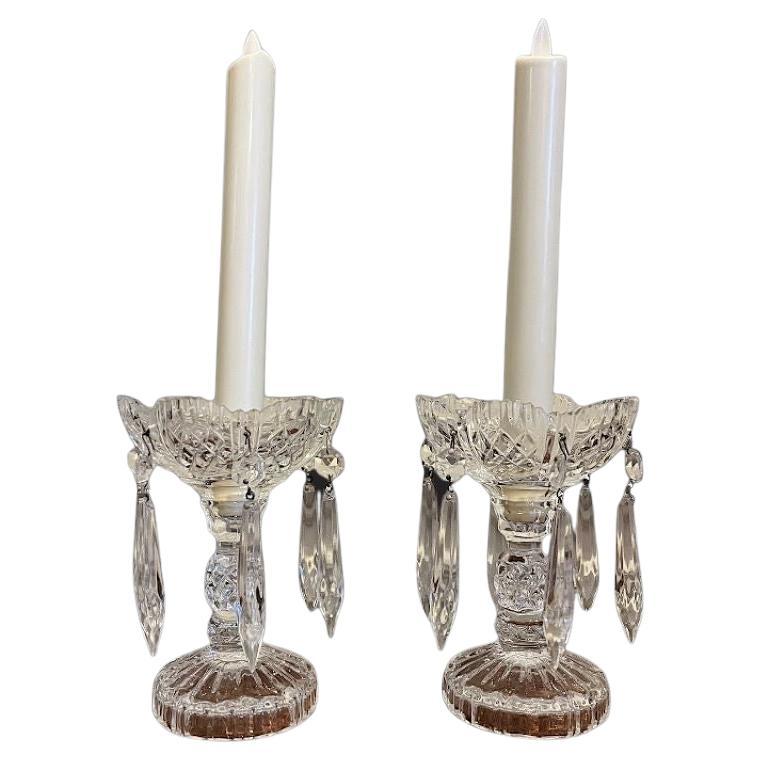 A pair of crystal cut candlestick lustres