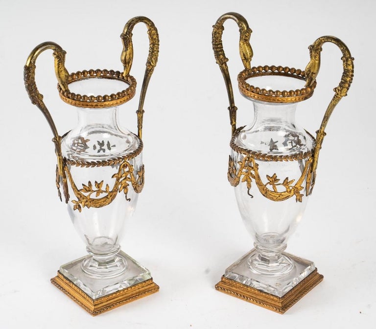 A pair of crystal vases with gilt bronze mountings.
Late 19th century, Napoleon III period.
In very good condition.
H: 28 cm, W: 16 cm, D: 8 cm.