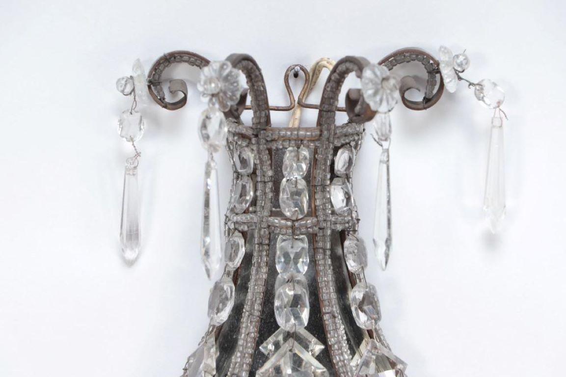 A pair of crystal wall sconces in the manner of Jansen circa 1940 In Good Condition For Sale In Philadelphia, PA