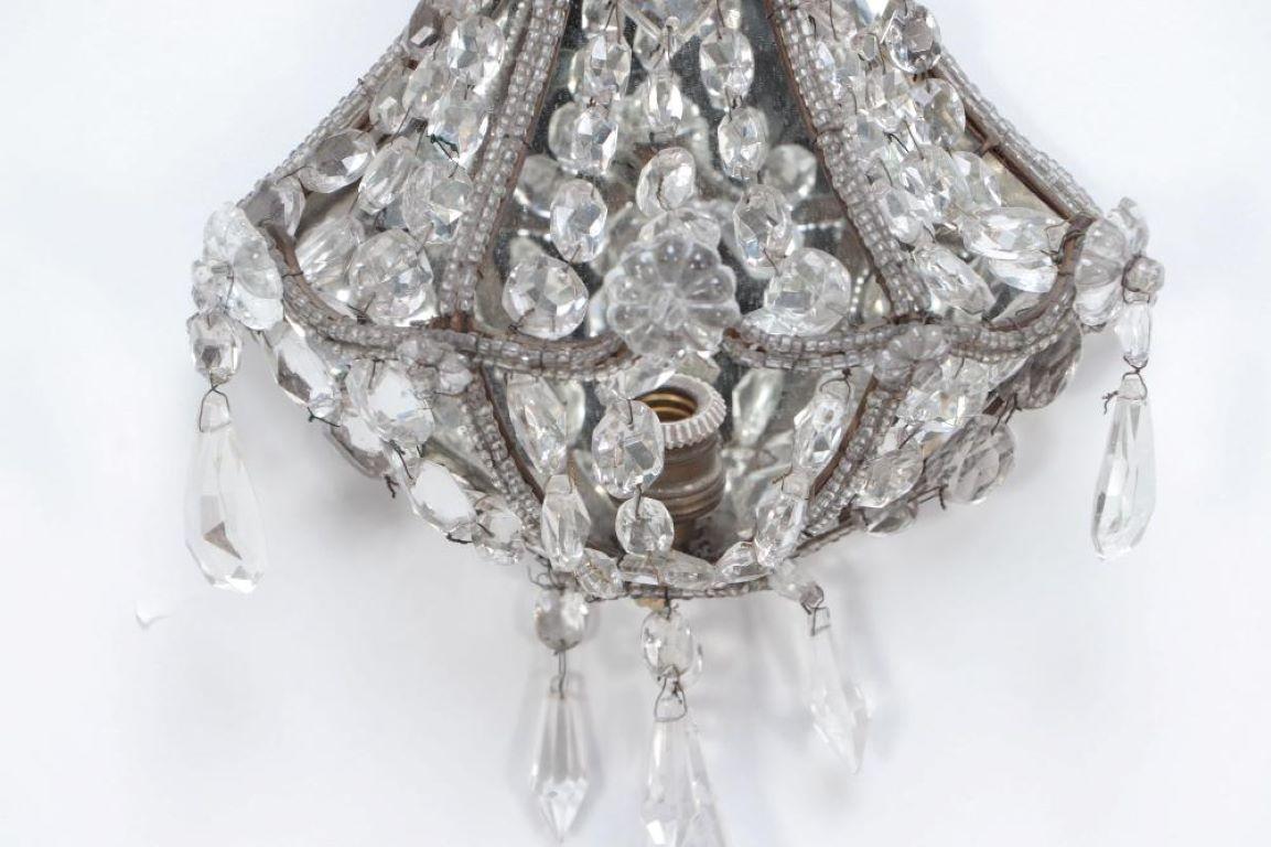 Mid-20th Century A pair of crystal wall sconces in the manner of Jansen circa 1940 For Sale