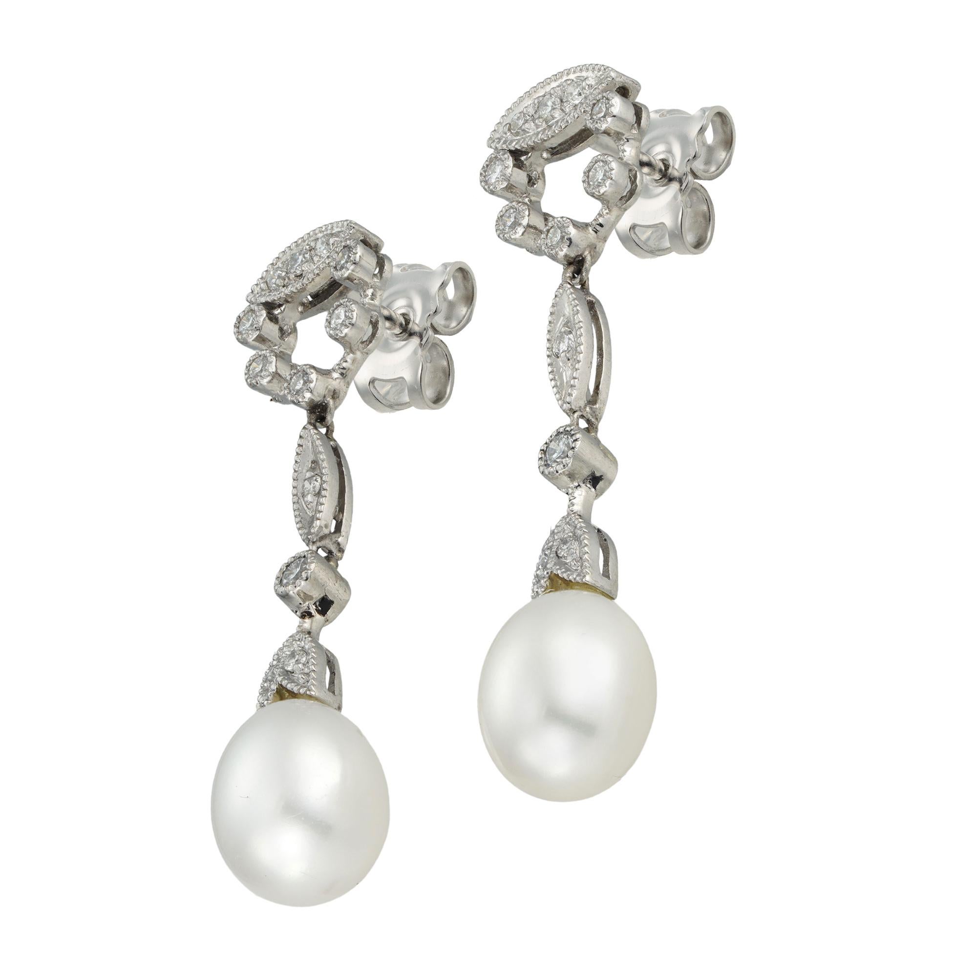 Modern A pair of cultured pearl and diamond drop earrings For Sale