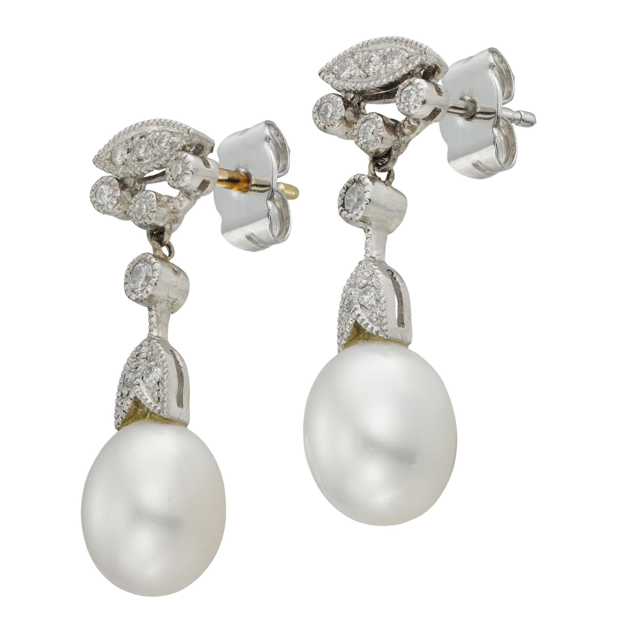 Modern A pair of cultured pearl and diamond drop earrings
