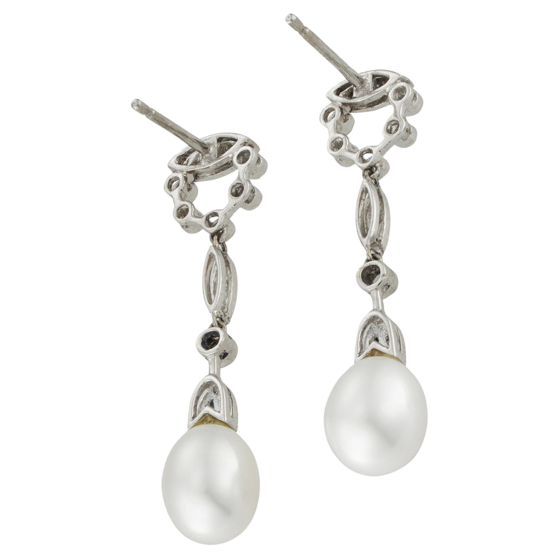 Brilliant Cut A pair of cultured pearl and diamond drop earrings For Sale