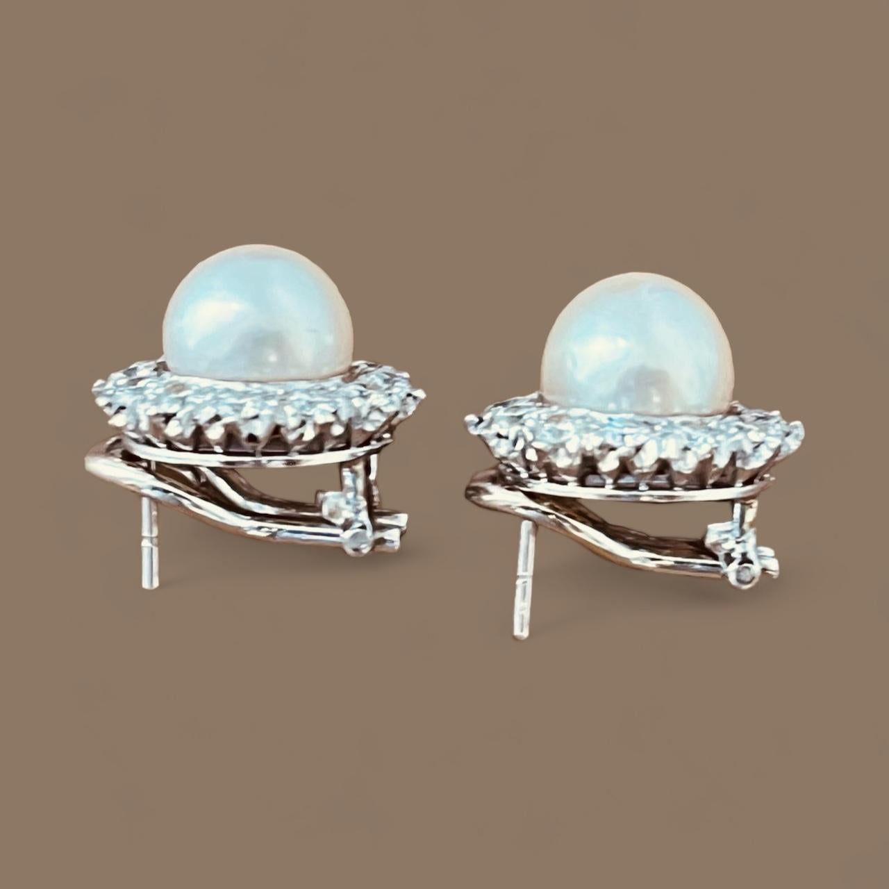 A Pair of Cultured Pearl and Diamond Earclips Mounted in Platinum. Circa 1970's  For Sale 6
