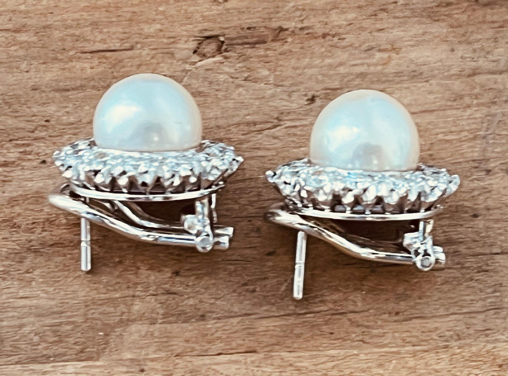 A Pair of Cultured Pearl and Diamond Earclips Mounted in Platinum. Circa 1970's  For Sale 11