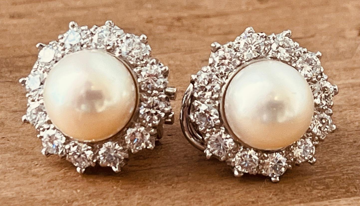 A Pair of Cultured Pearl and Diamond Earclips Mounted in Platinum. Circa 1970's  For Sale 15