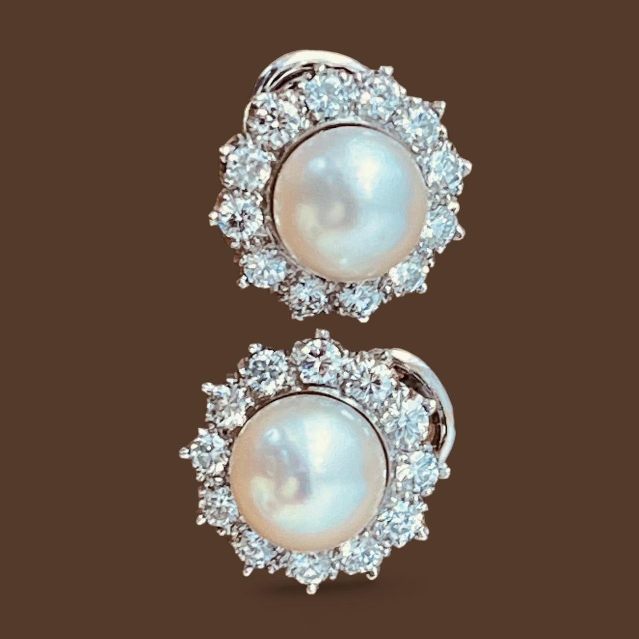 A Pair of Cultured Pearl and Diamond Earclips Mounted in Platinum. Circa 1970's  For Sale 3