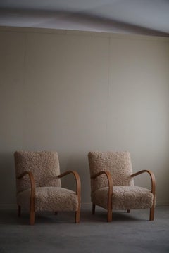 A Pair of Curved Art Deco Lounge Chairs in Lambswool, Danish Modern, 1940s