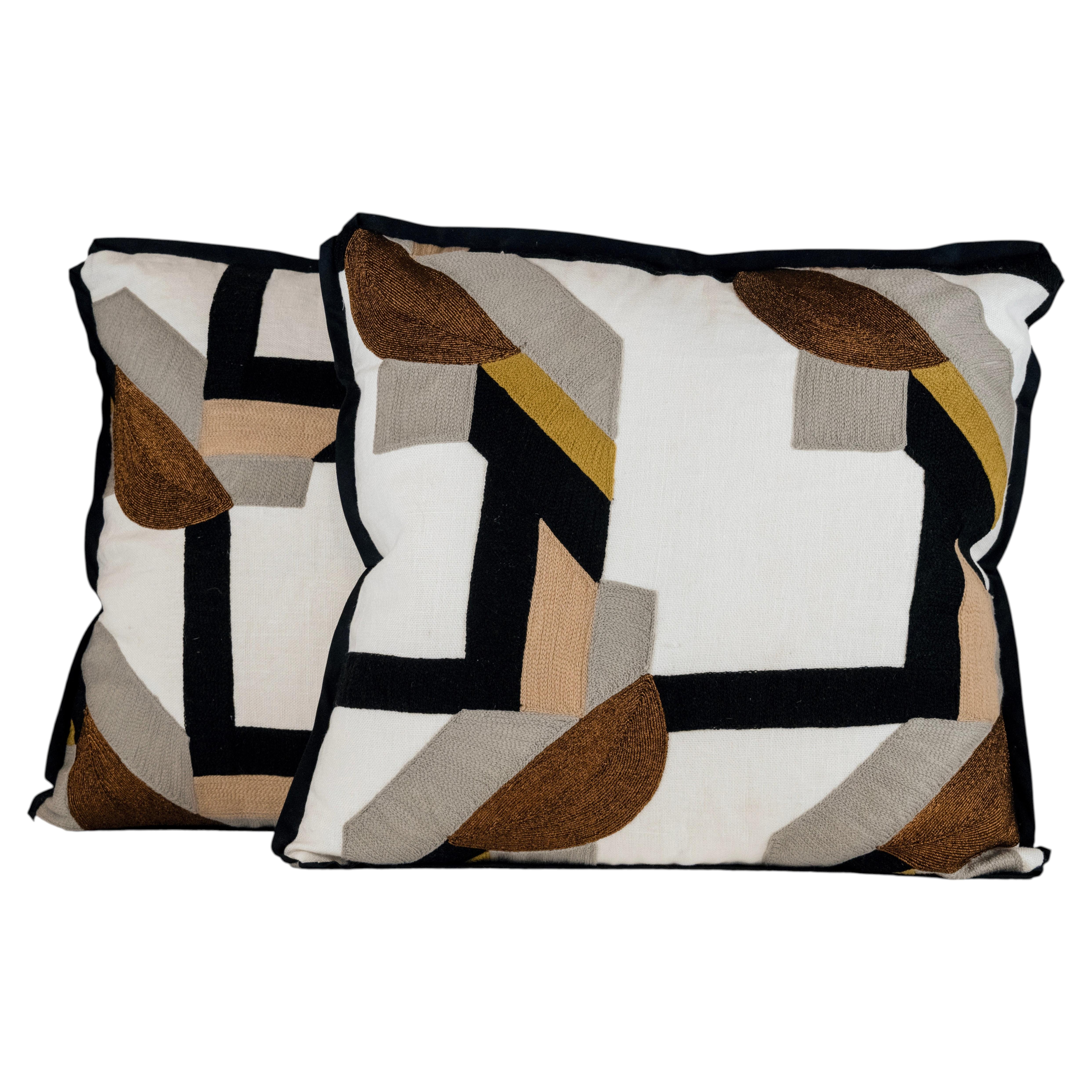 A Pair of Cushions in Pierre Frey Cosma Argento Oro