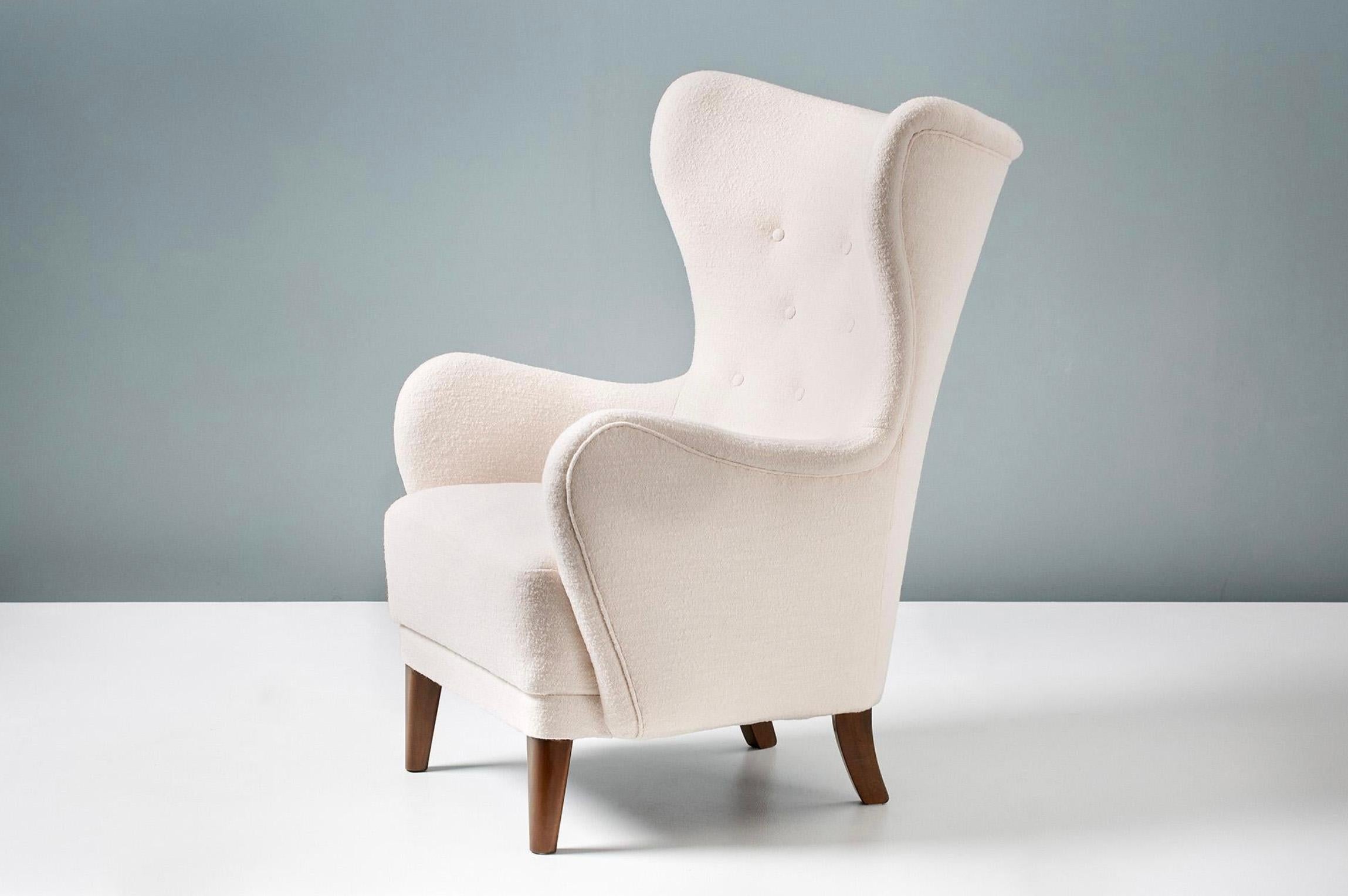 Dagmar Design - Albin wing chair

A custom-made wing chair developed & produced at our workshops in London using the highest quality materials. The frame is built from solid tulipwood with a fully sprung seat. This example is upholstered in Chase