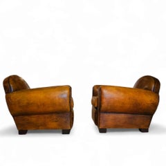 A Pair of Custom Normandy Club Chairs Attributed to Jean de Merry, 20th C.