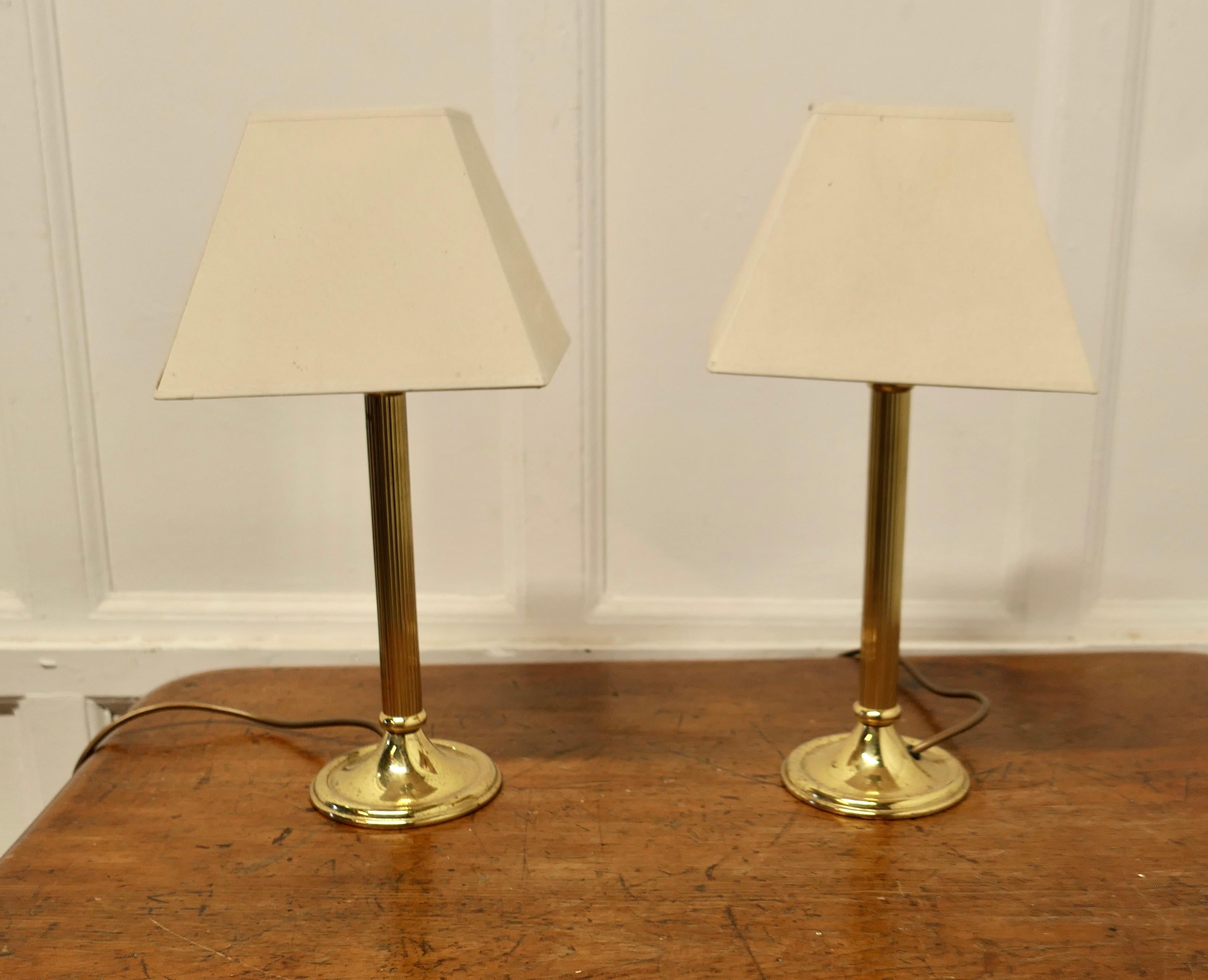 Late 20th Century A pair of Dainty Brass Corinthian Column Bedside Lamps with Shades  