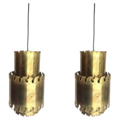 A pair of Danish 1960s, Holm Sorensen brass pendant lights