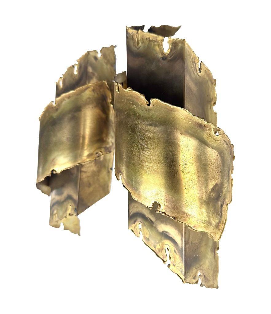 A pair of Danish 1960s Holm Sorensen torch cut brass wall sconces In Good Condition For Sale In London, GB