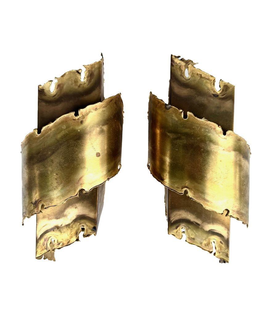Mid-20th Century A pair of Danish 1960s Holm Sorensen torch cut brass wall sconces For Sale