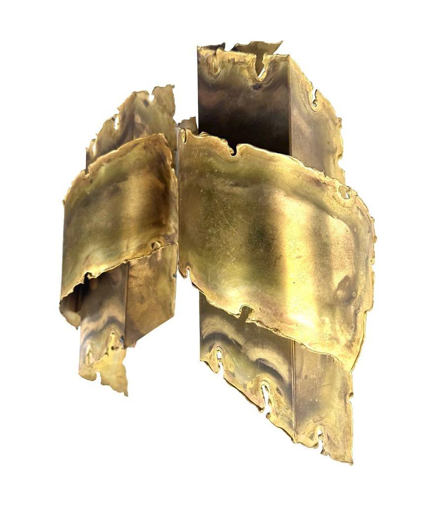 A pair of Danish 1960s Holm Sorensen torch cut brass wall sconces For Sale 1