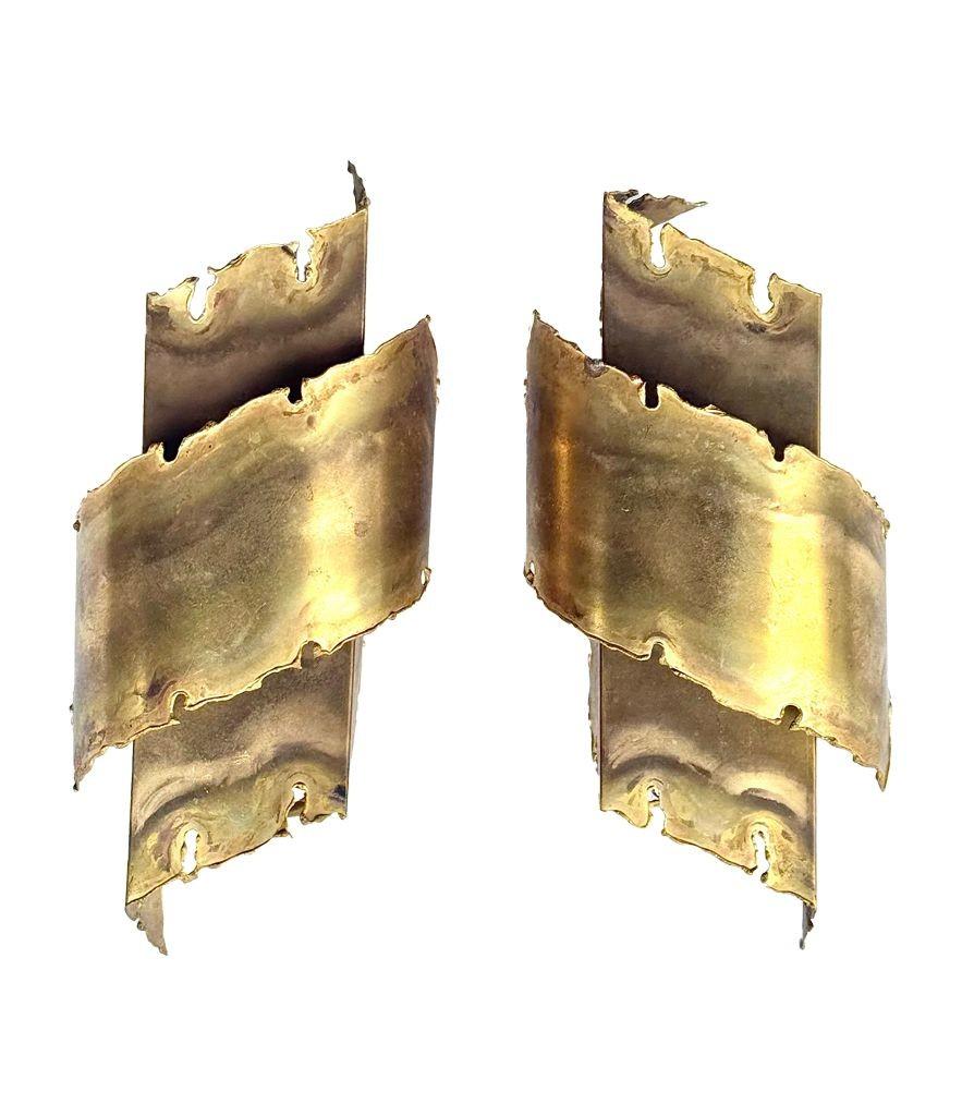 A pair of Danish 1960s Holm Sorensen torch cut brass wall sconces For Sale 2
