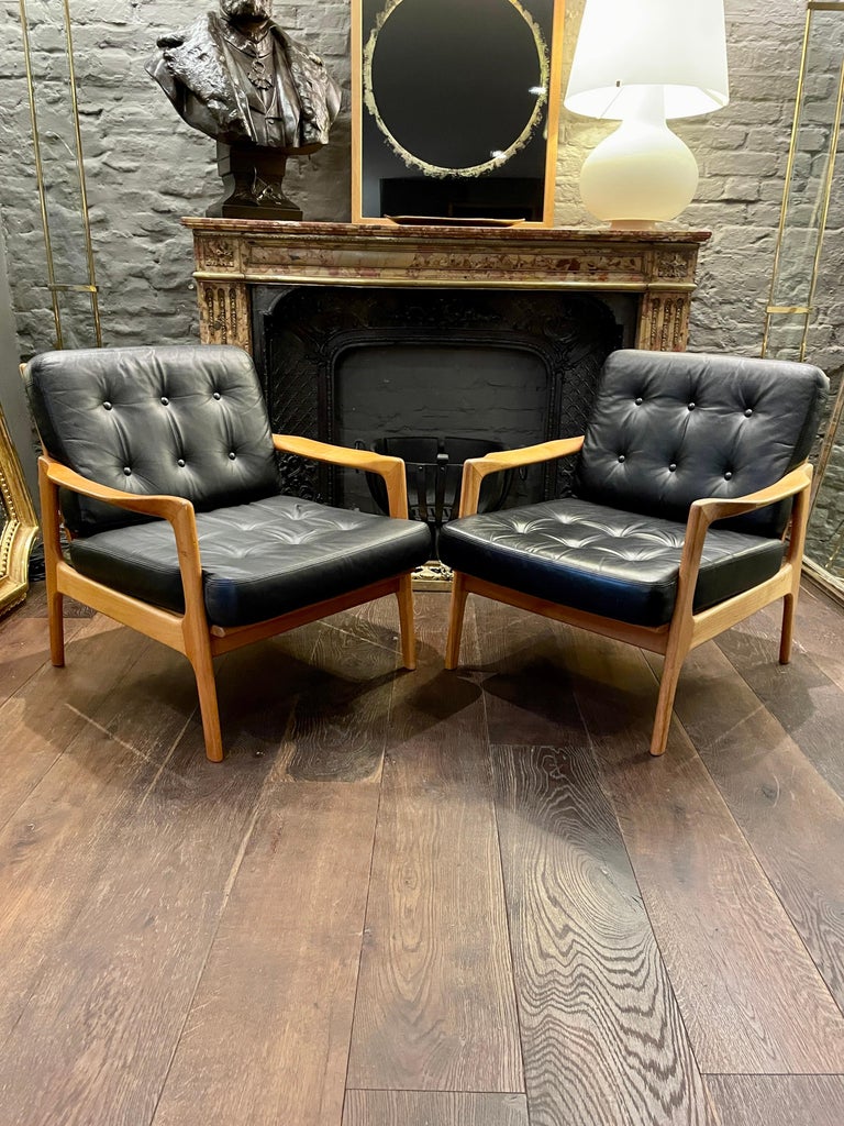 Mid-Century Modern Pair of Danish Black Leather and Cherry Wood Armchairs For Sale