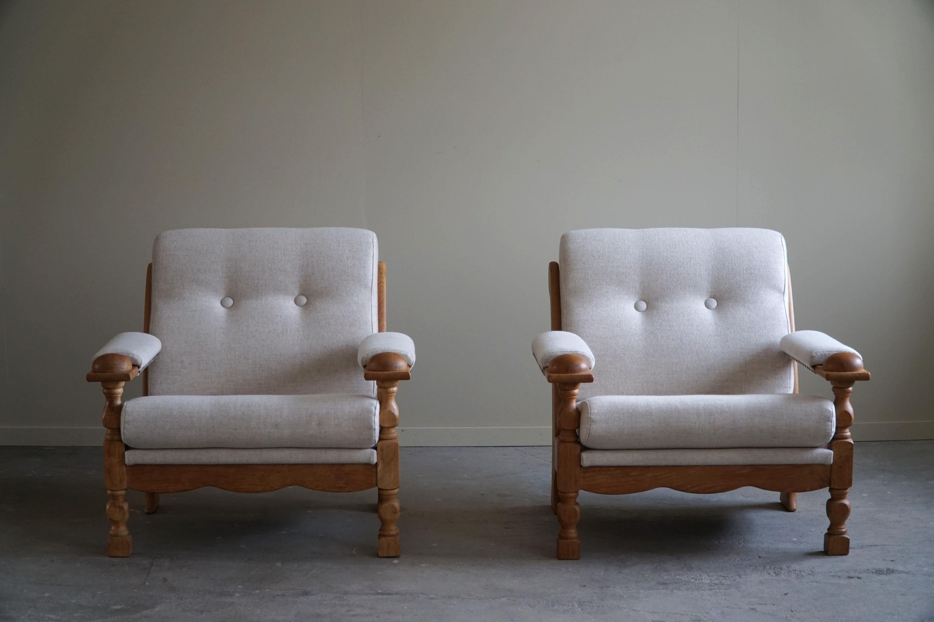 Presenting a stunning pair of Danish Modern Lounge Chairs that summarize the essence of mid-century design. Attributed to the renowned Danish designer Henning Kjærnulf and meticulously crafted during the 1960s, these chairs are a true testament to