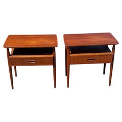 A pair of Danish Teak night stands by Gunni Omann 1960's