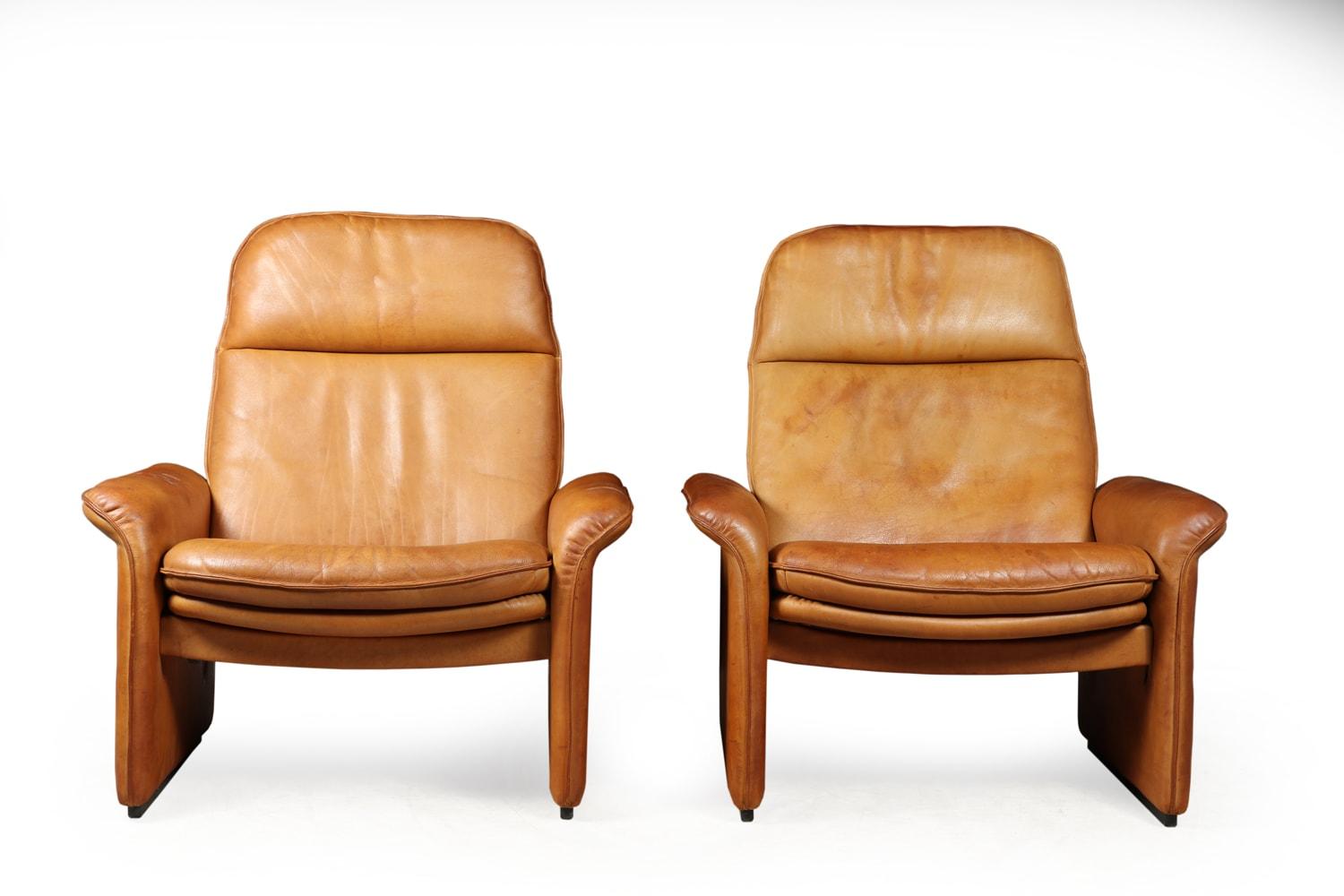 A Pair of De Sede reclining DS50 in tan neck leather

A pair of relining chairs from the exclusive range of De Sede. Produced in the Switzerland in the 1960’s these chairs remain in great original condition. They have a thick neck leather in a tan