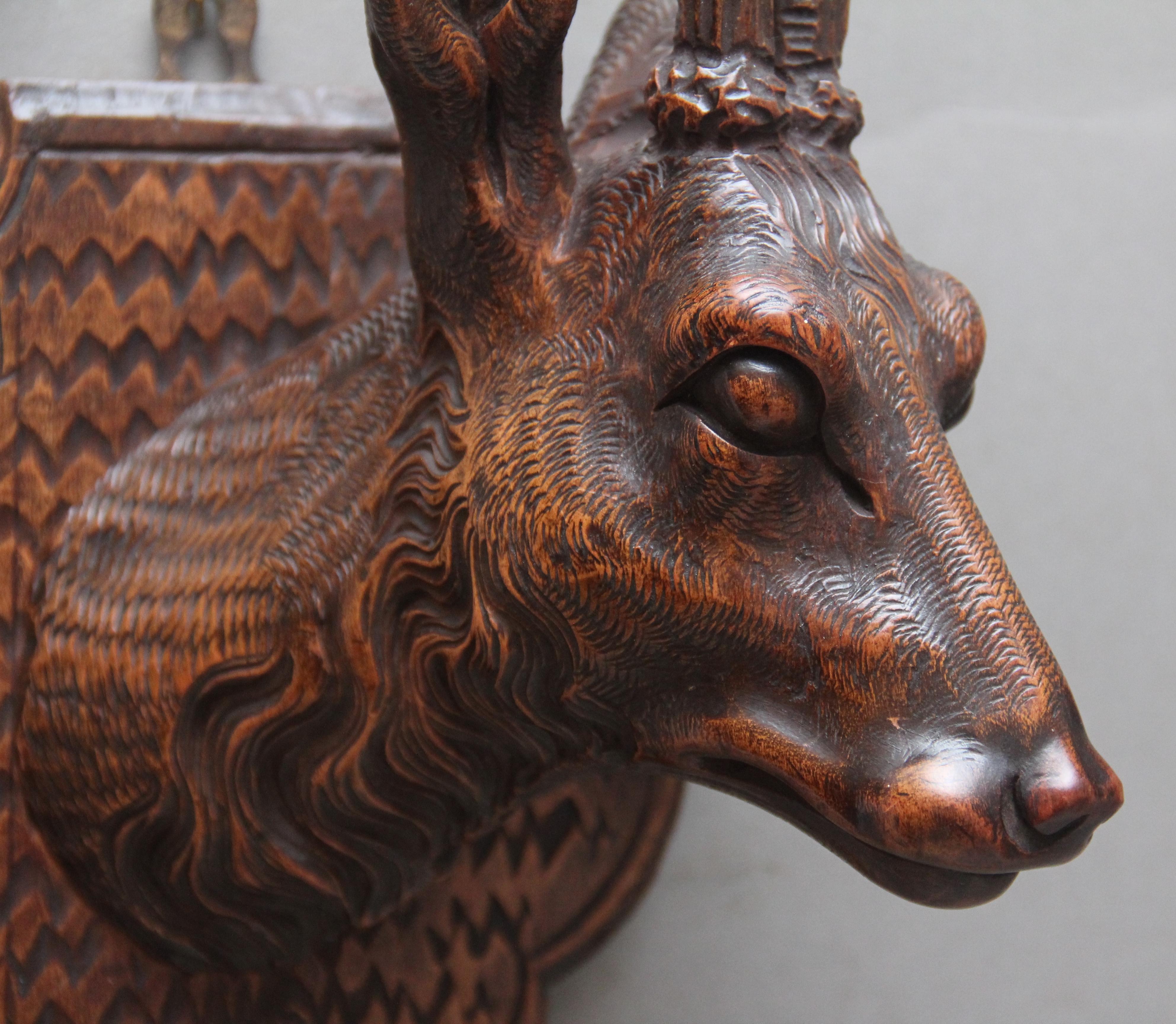A pair of decorative 19th Century carved walnut black forest deer heads In Good Condition In Martlesham, GB