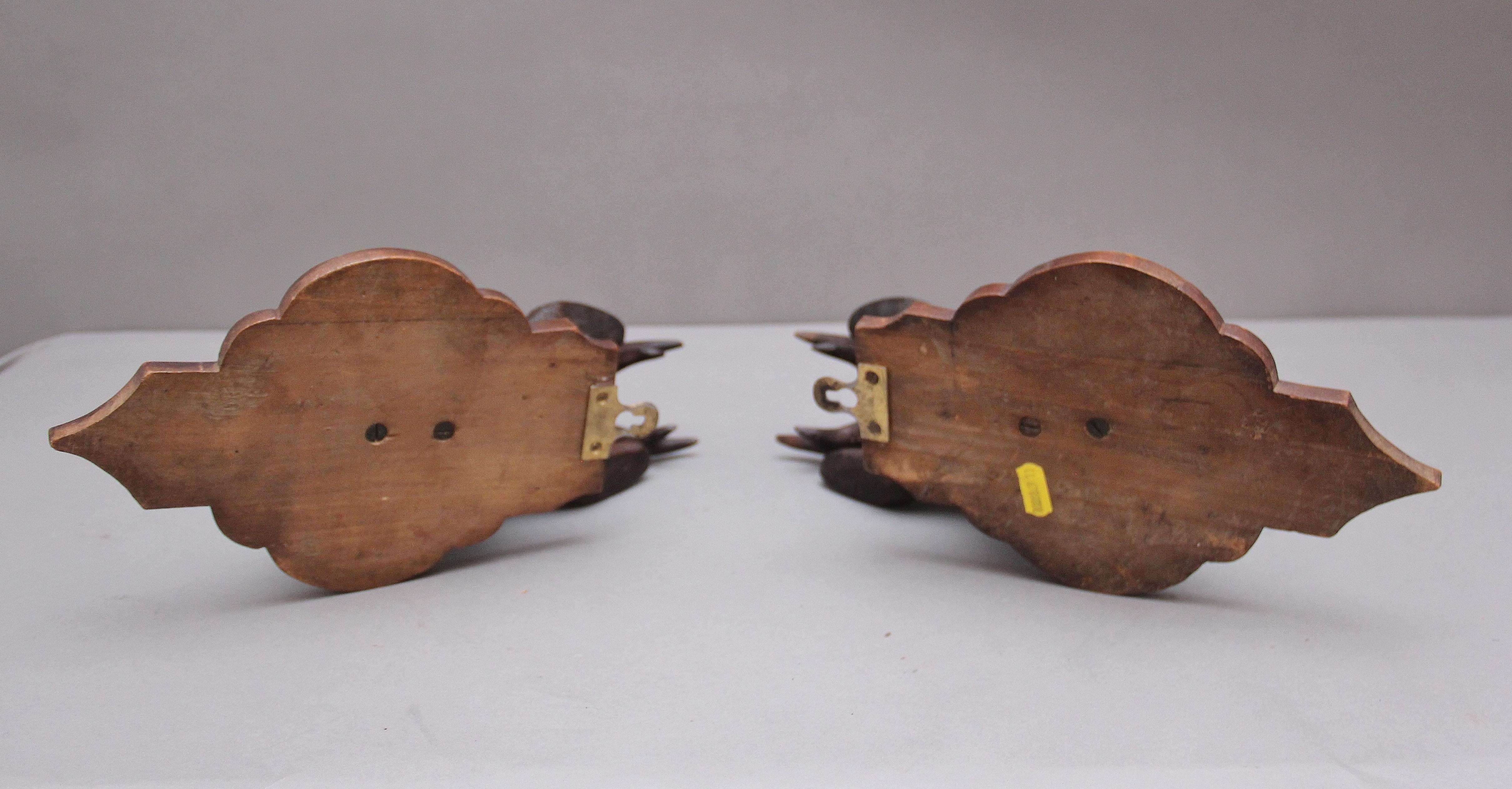 Late 19th Century A pair of decorative 19th Century carved walnut black forest deer heads