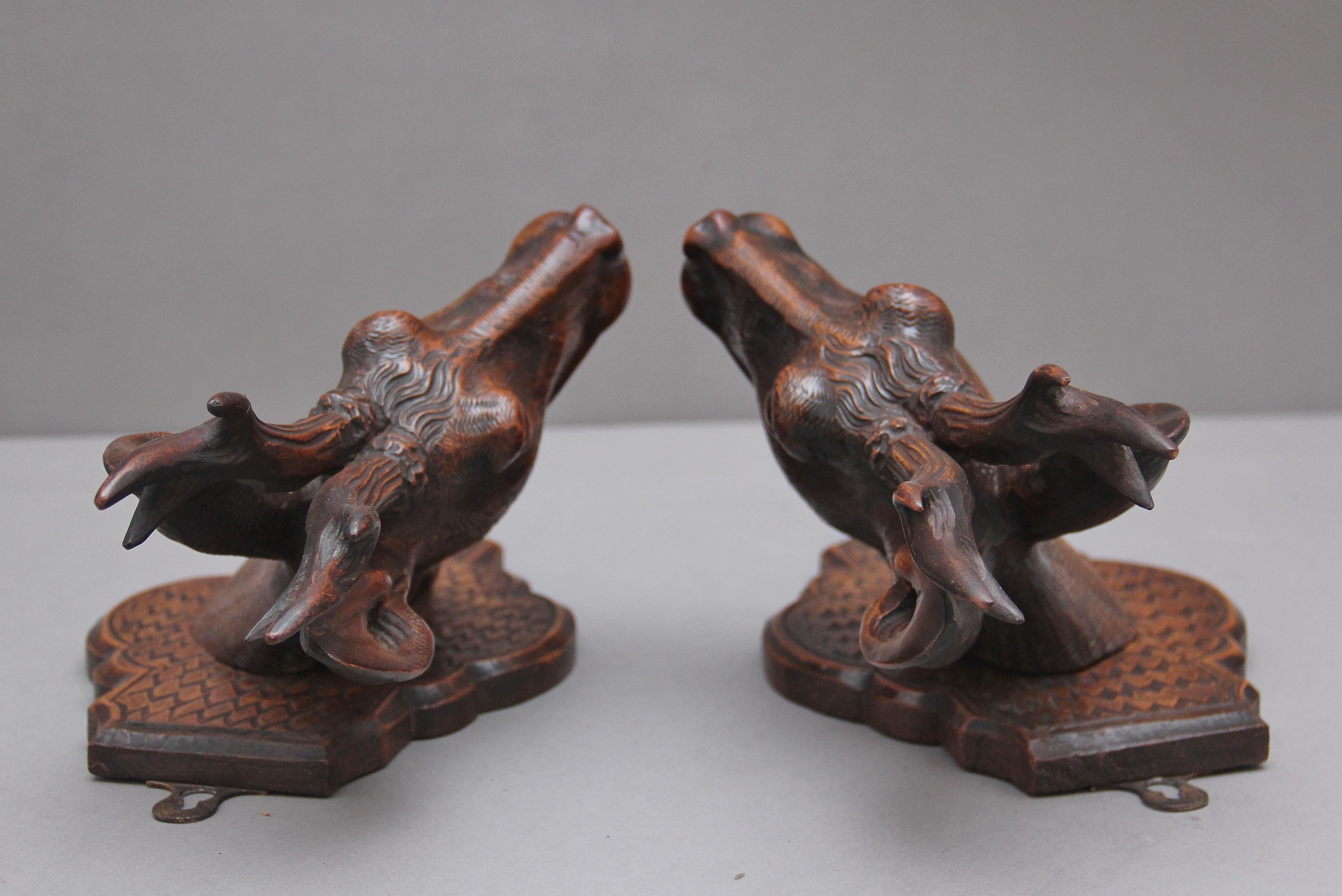 A pair of decorative 19th Century carved walnut black forest deer heads 1