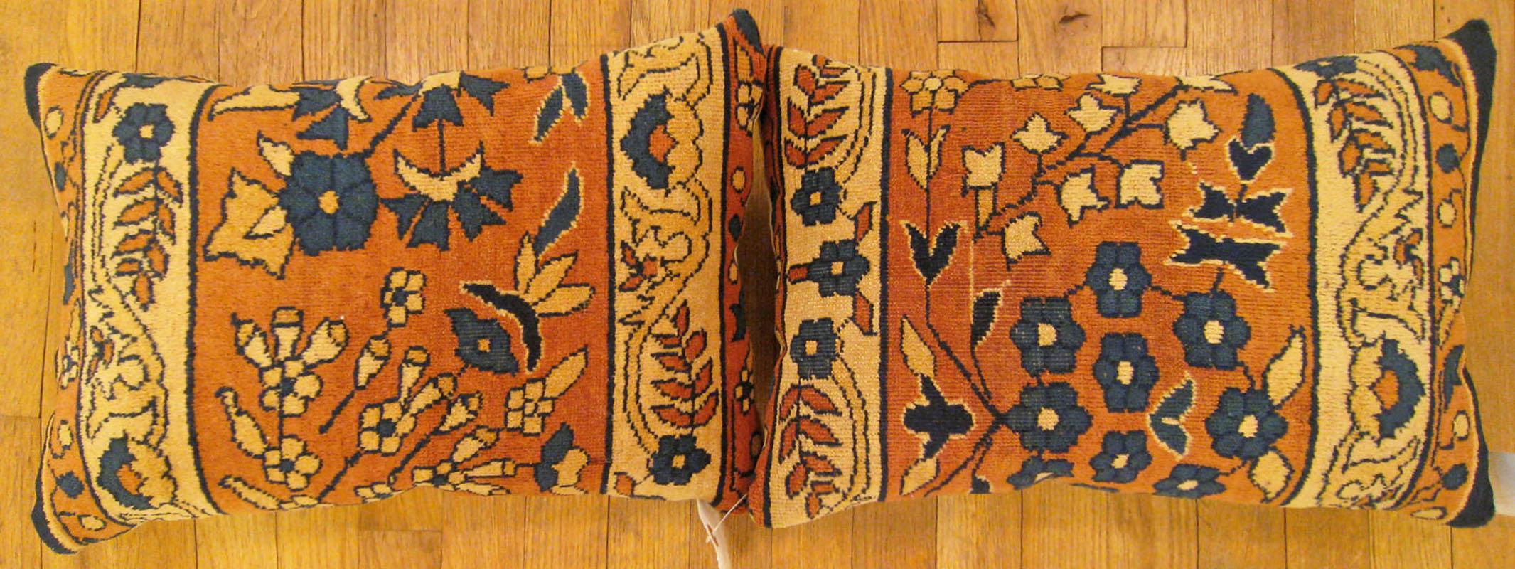 A Pair of Antique Indian Agra rug pillows ; size 1'8” x 1'2” Each.

An antique decorative pillows with floral elements allover a salmon central field, size 1'8” x 1'2” each. This lovely decorative pillow features an antique fabric of a Agra rug on