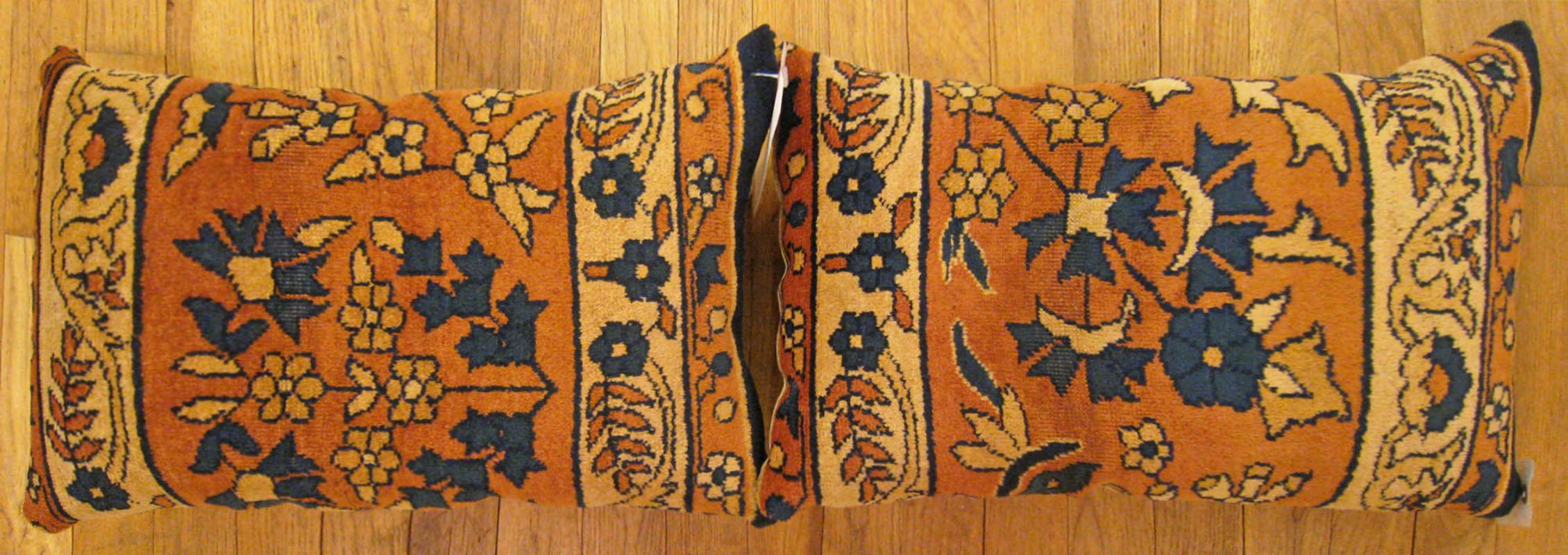 A pair of antique Indian Agra rug pillows ; size 1'8” x 1'1” Each.

An antique decorative pillows with floral elements allover a salmon central field, size 1'8” x 1'1” each. This lovely decorative pillow features an antique fabric of a Agra rug on