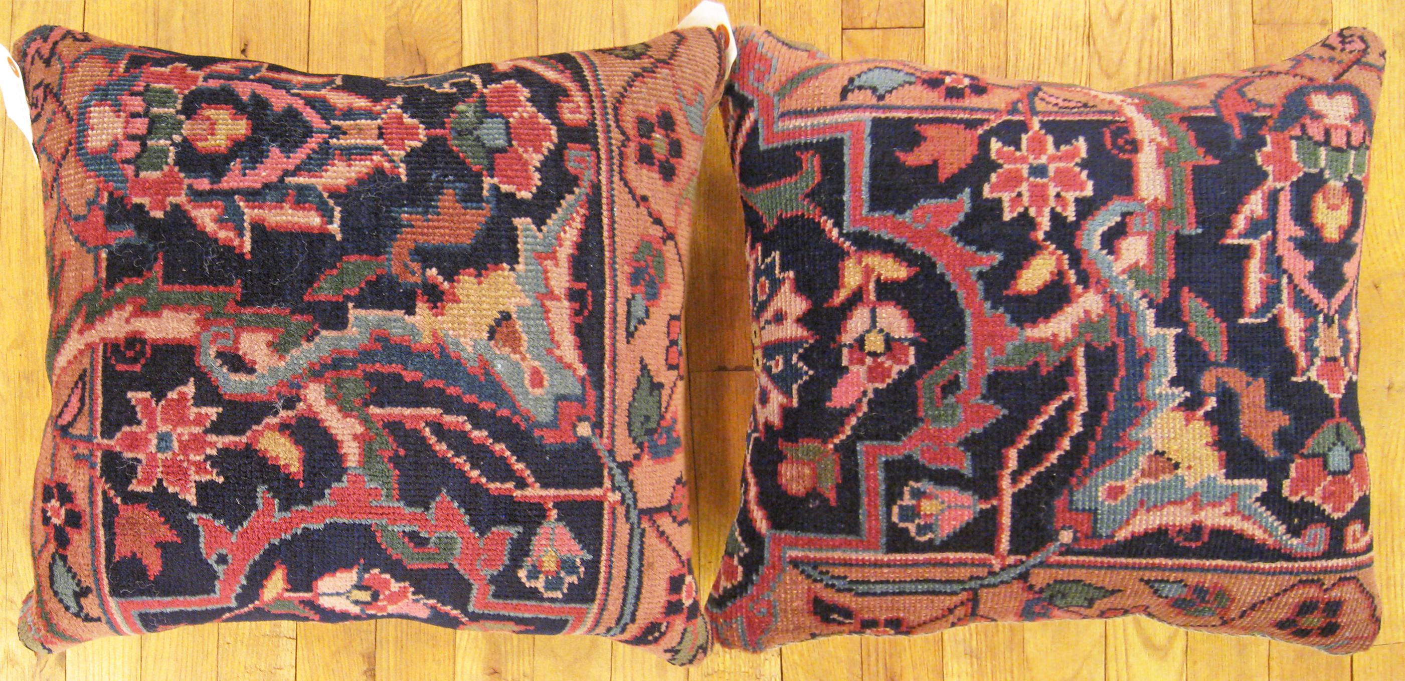 A Pair of Antique Indian Agra Rug Pillows ; size 1'6” x 1'4” Each.

An antique decorative pillows with floral elements allover a coral central field, size 1'6” x 1'4” each. This lovely decorative pillow features an antique fabric of a Agra rug on