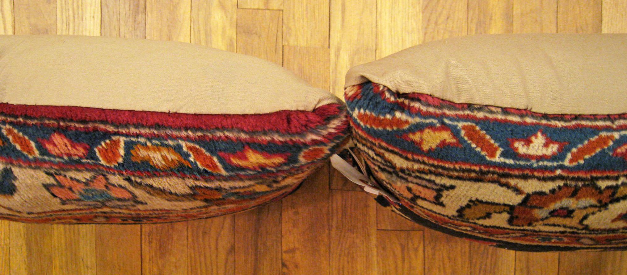 Pair of Decorative Antique Indian Agra Rug Pillows with Floral Elements In Good Condition For Sale In New York, NY