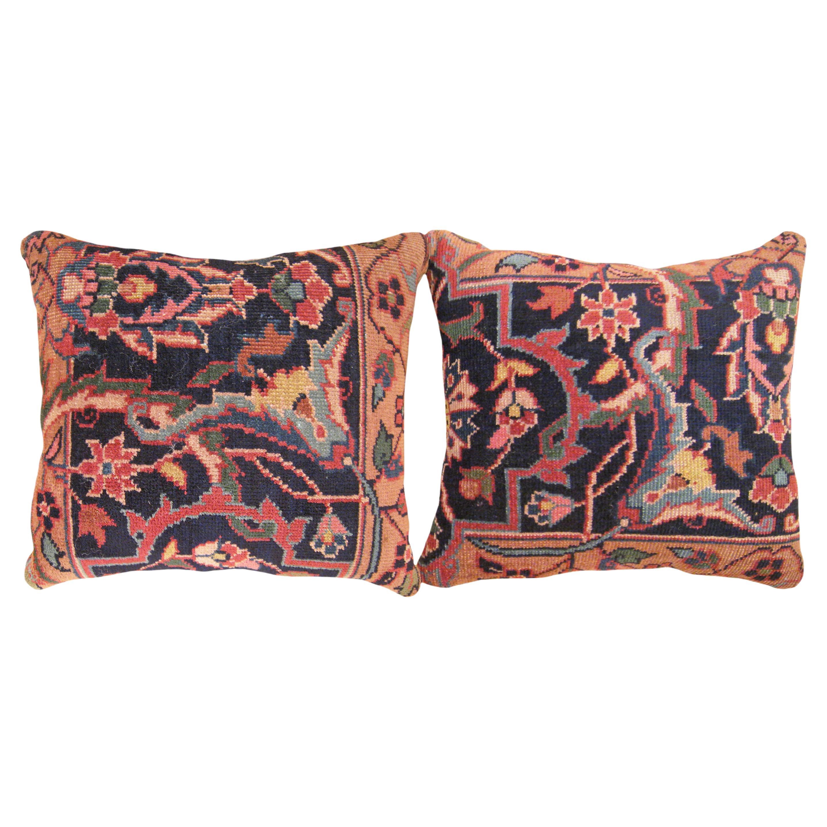 A Pair of Decorative Antique Indian Agra Rug Pillows with Floral Elements For Sale