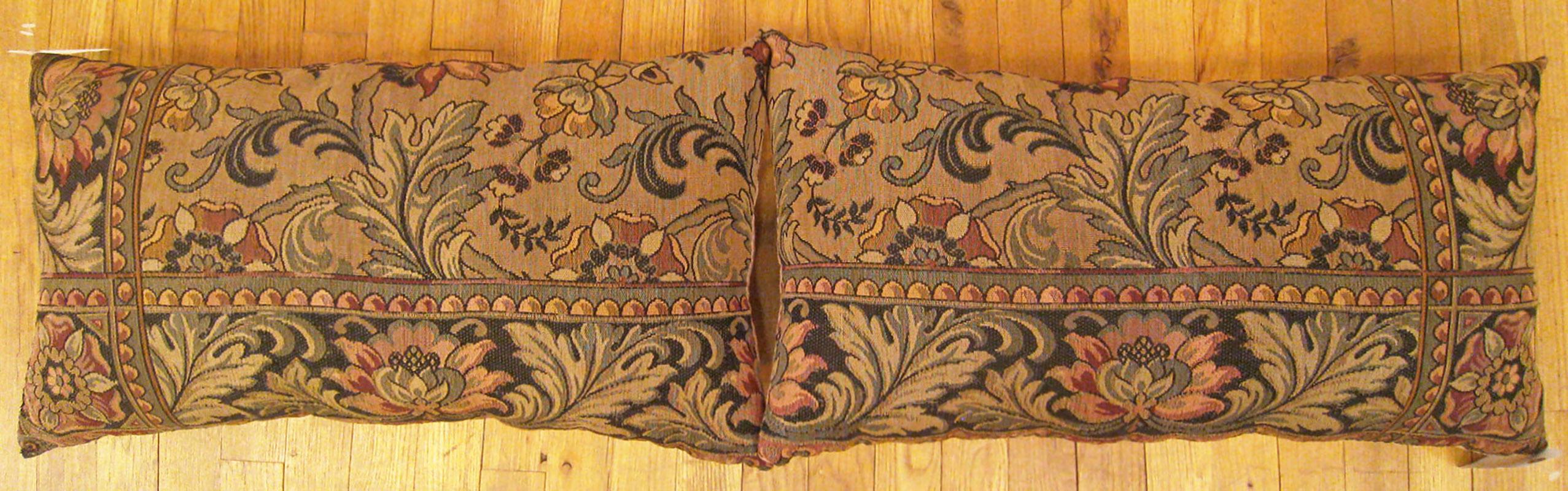 A pair of antique Jacquard Tapestry pillows ; size 1'3” x 2'2” Each.

An antique decorative pillows with floral elements allover a brown central field, size 1'3