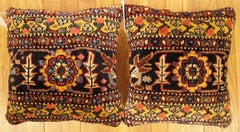 Pair of Decorative Antique Persian Bidjar Carpet Pillows with Floral Elements
