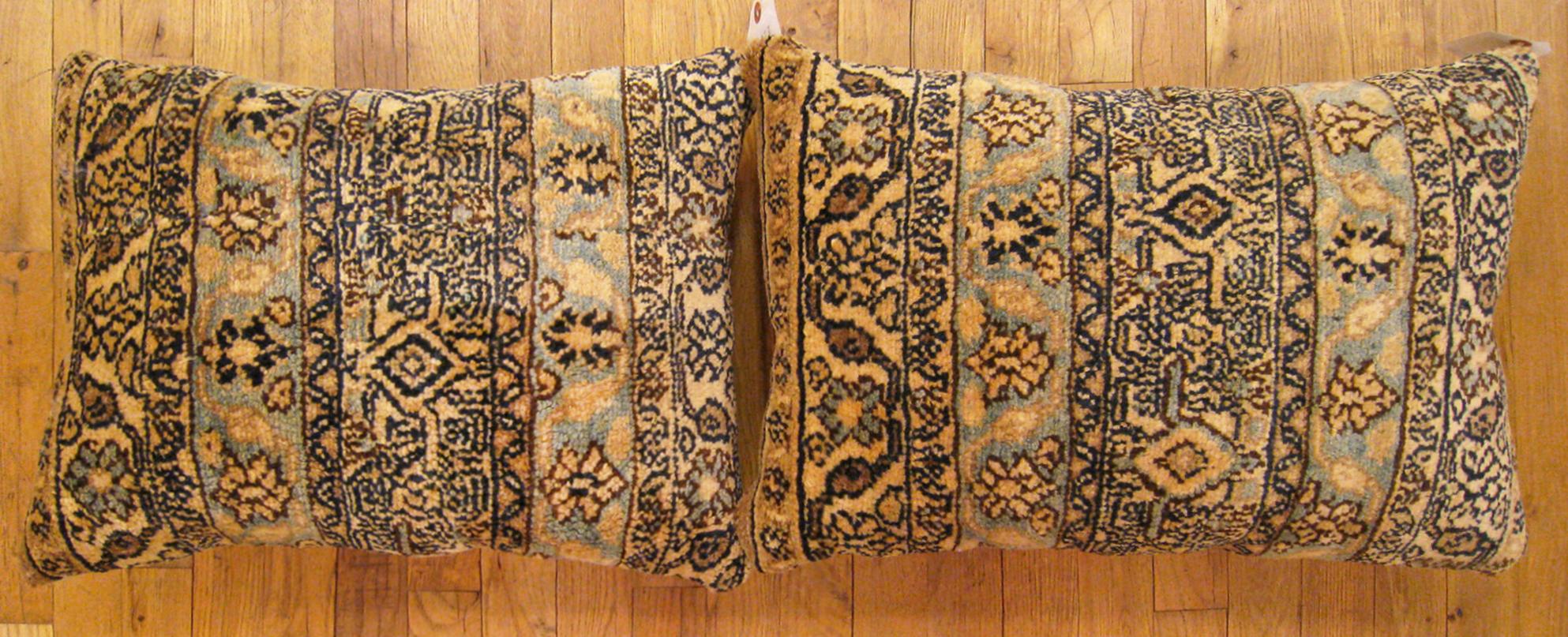 A pair of Antique Persian Hamadan rug pillows ; size 1'10” x 1'6” and 2'0” x 1'6”.

An antique decorative pillows with floral elements allover a beige central field, size 1'10” x 1'6” and 2'0” x 1'6”. This lovely decorative pillow features an