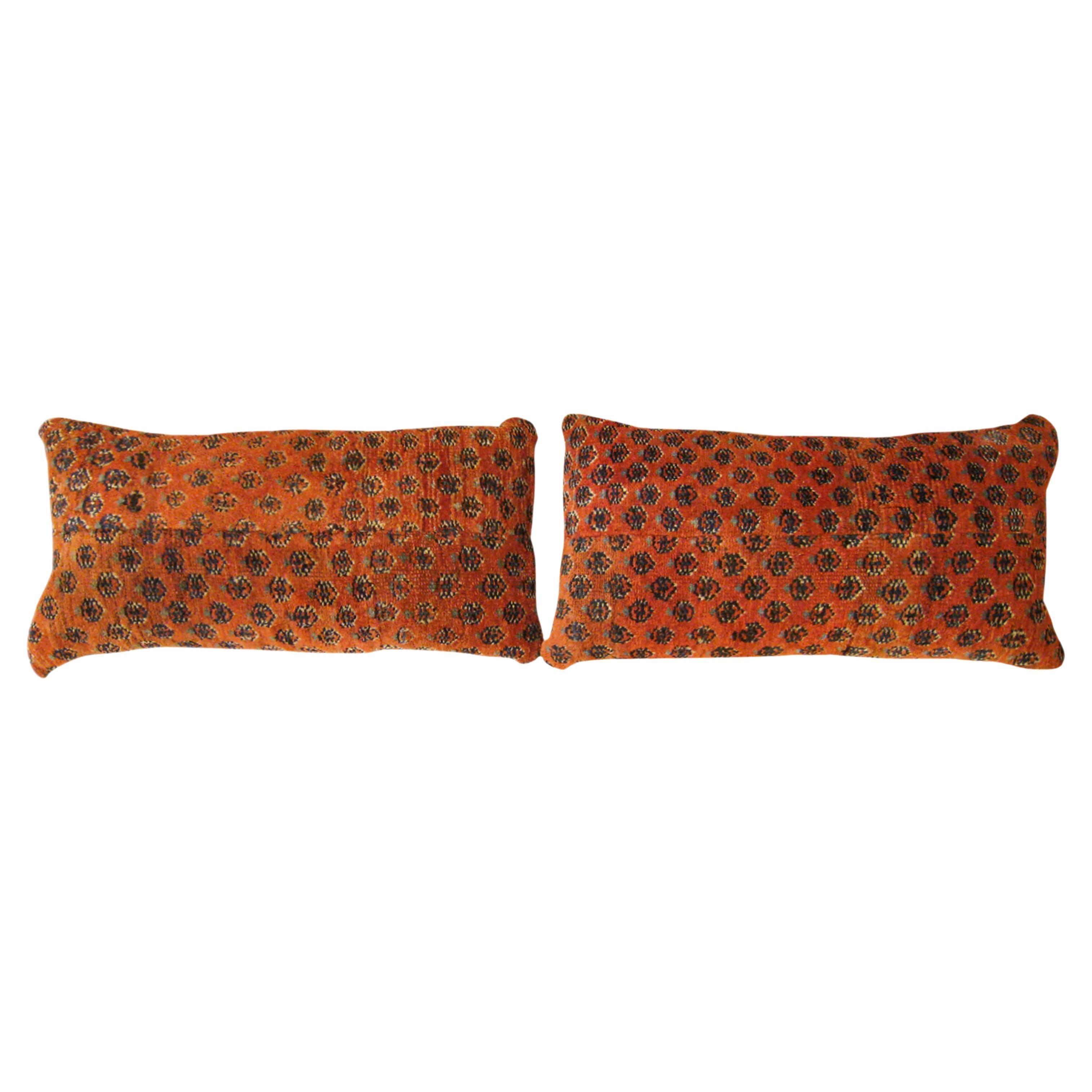 Pair of Decorative Antique Persian Saraband Carpet Pillows with Floral Element For Sale